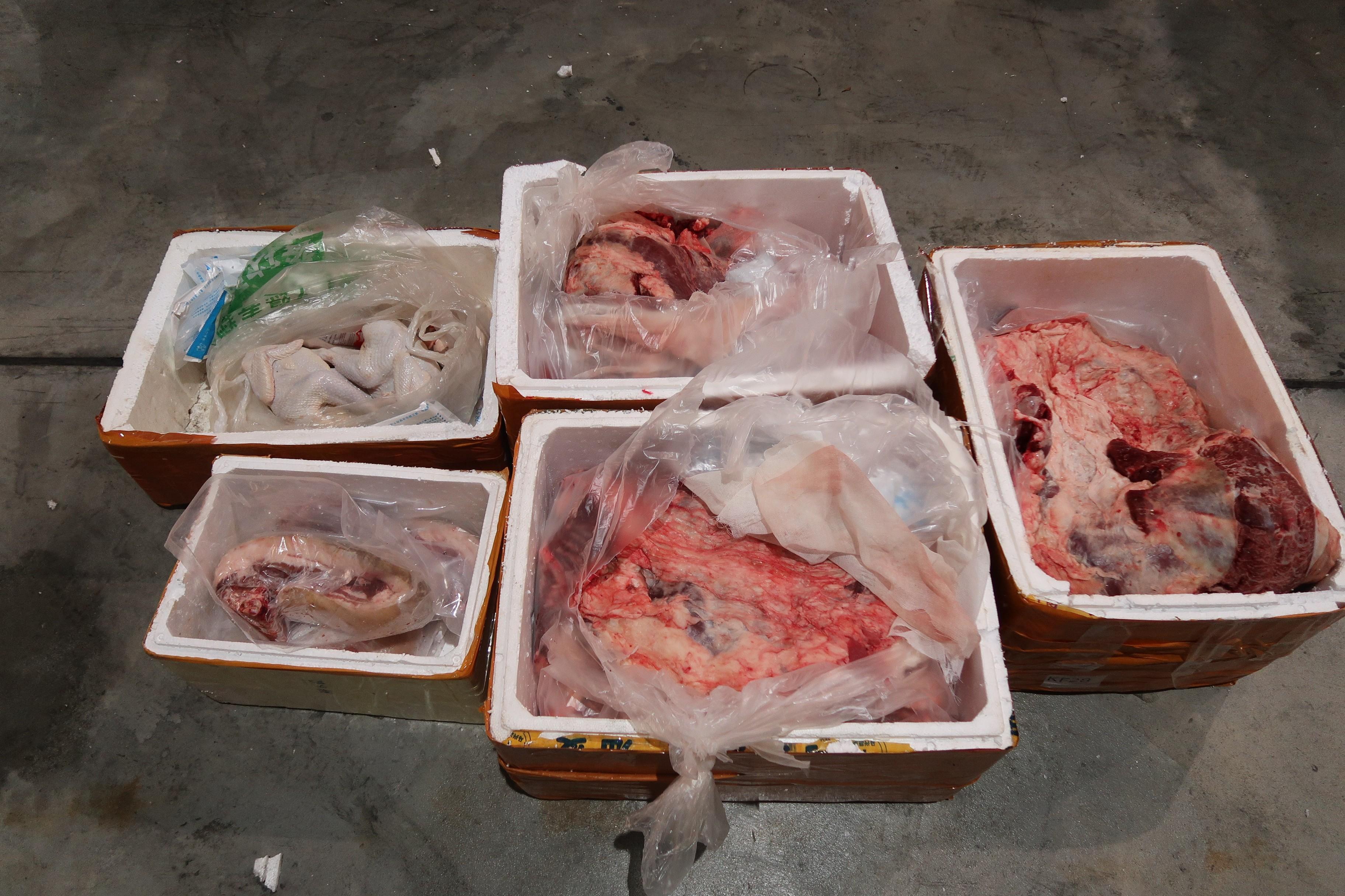 Hong Kong Customs on February 11 detected a suspected food smuggling case and seized approximately 4 800 kilograms of suspected illegally imported food with a total estimated market value of about $400,000. Photo shows some of the suspected frozen meat seized. 
