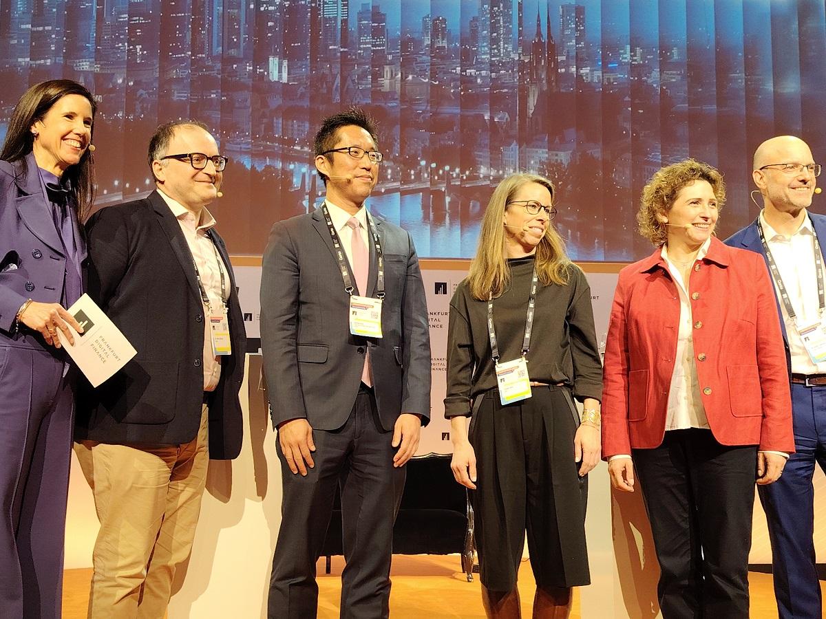 The Hong Kong Economic and Trade Office, Berlin (HKETO Berlin) promoted the unique advantages of Hong Kong as an international financial centre at the Frankfurt Digital Finance conference held in Frankfurt, Germany on February 11 and 12 (Frankfurt time). Photo shows the Director of HKETO Berlin, Mr Indiana Wong (third left), speaking at a panel discussion titled "Transformation and Venture Capital: The Role of Public and Private Players for Accelerating Digital Growth". Other speakers or moderators are the Managing Director of Frankfurt Digital Finance, Ms Corinna Egerer (first left); the Chief Executive Officer of Raisin, Dr Tamaz Georgadze (second left); member of the Board of Managing Directors of LBBW Ms Stefanie Münz (third right); Vice-President of the European Investment Bank Ms Nicola Beer (second right); and Partner at Latham & Watkins Dr Markus Krüger (first right).