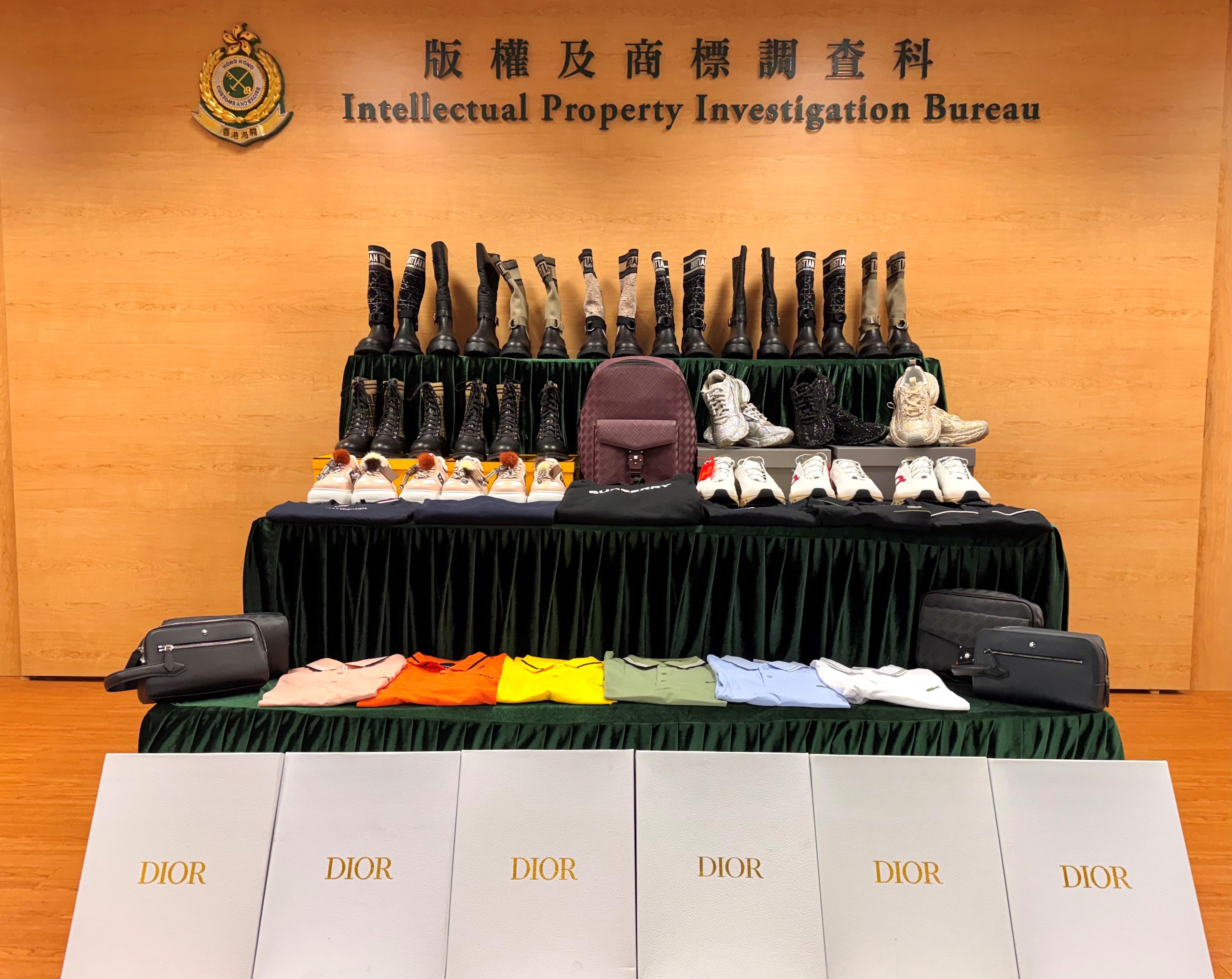 Hong Kong Customs on January 31 seized about 4 200 suspected counterfeit goods including footwear, bags and clothing, with an estimated market value of about $2.8 million, at Hong Kong International Airport. Photo shows the suspected counterfeit goods seized.