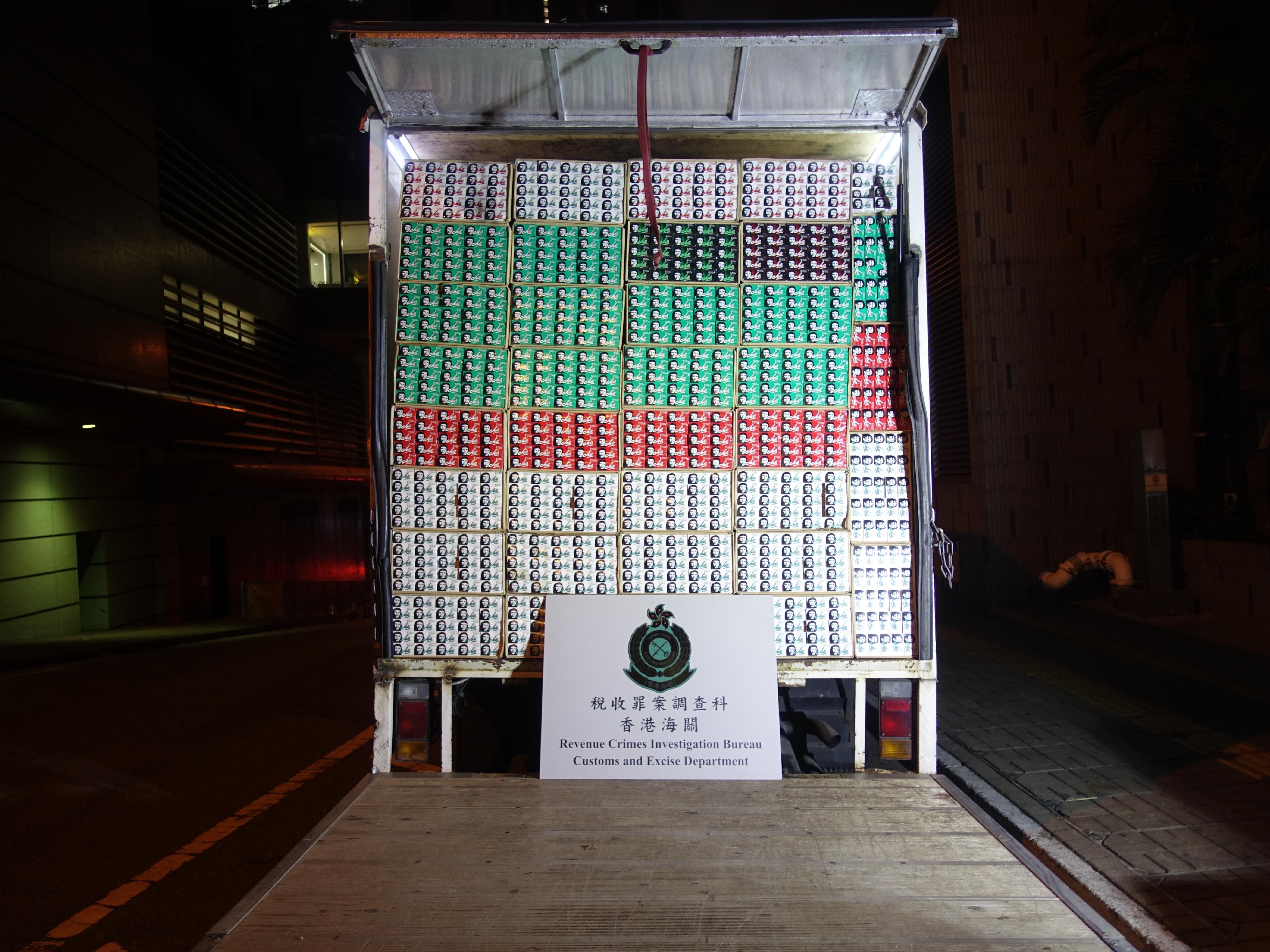 In view of the arrival of the Lunar New Year, Hong Kong Customs mounted a territory-wide enforcement operation codenamed "Thunder" from January 11 to February 12 to combat illicit cigarette telephone-ordering activities at the storage, distribution and peddling levels. Photo shows a vehicle suspected to be used for illicit cigarette distribution and the suspected illicit cigarettes seized.

