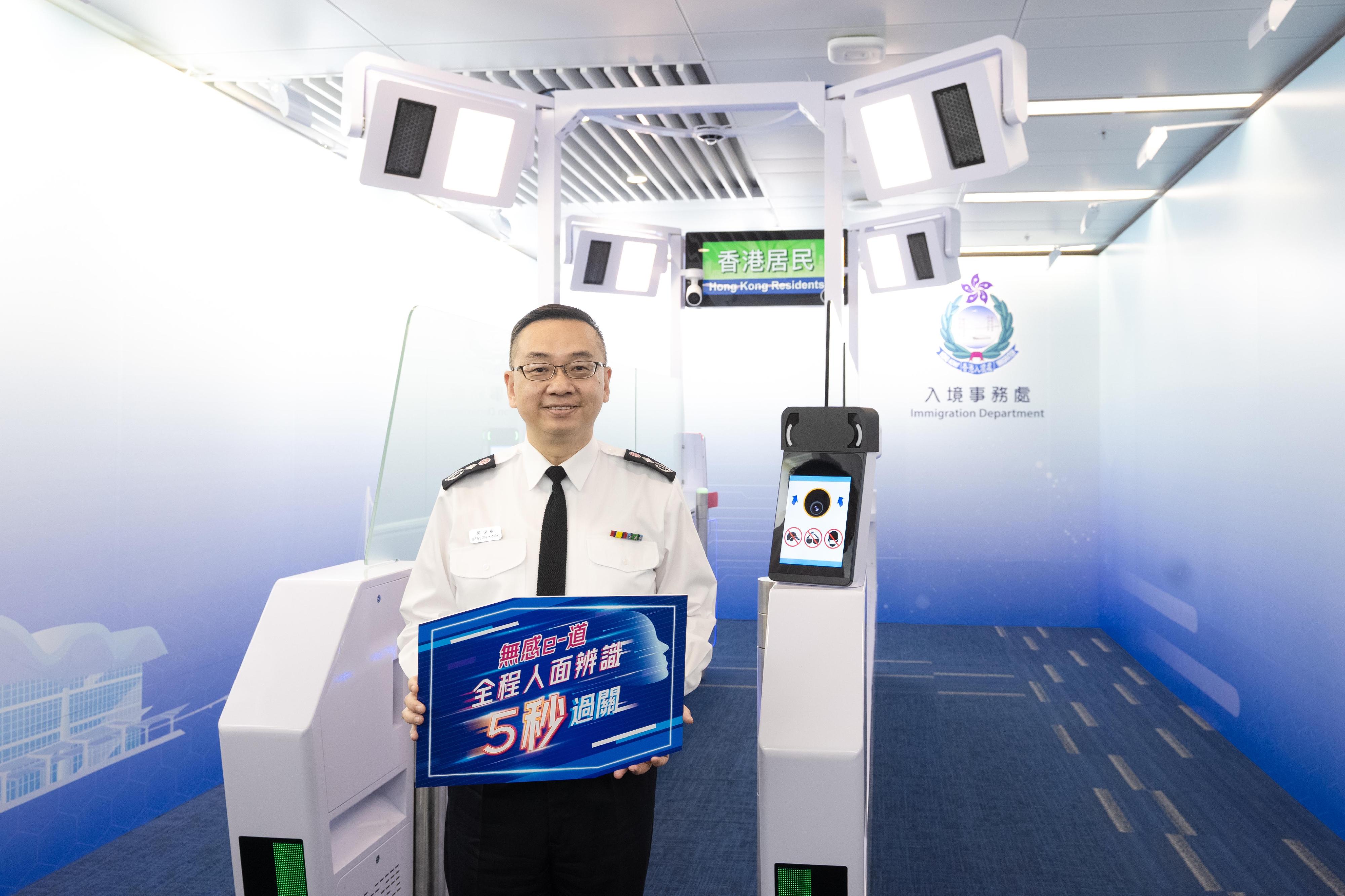 The Immigration Department's year-end review of 2025 was held today (February 13). Photo shows the Director of Immigration, Mr Benson Kwok, introducing the "contactless clearance" pilot scheme.