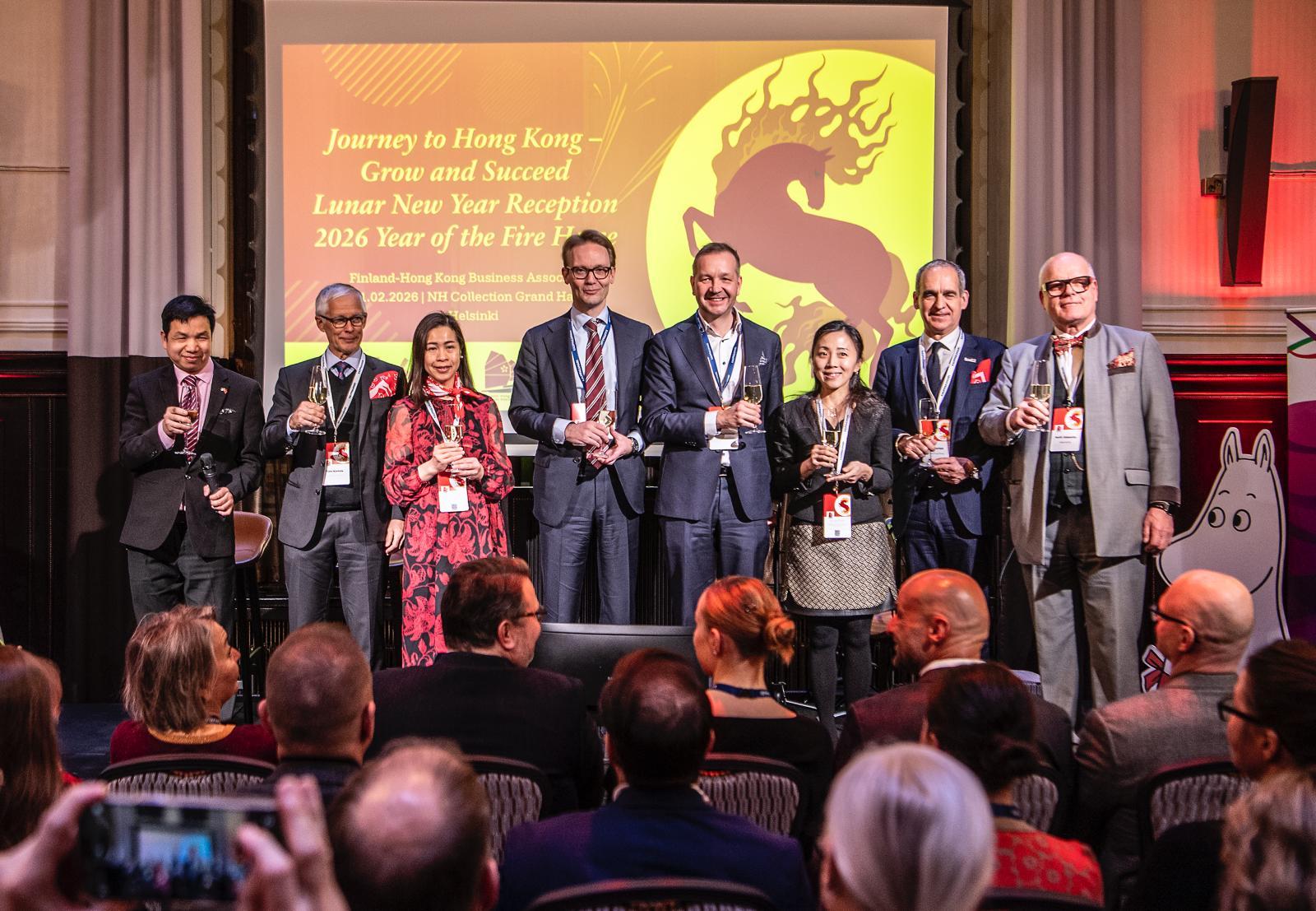 The Hong Kong Economic and Trade Office in London (London ETO), in collaboration with Invest Hong Kong (InvestHK) and the Hong Kong Trade Development Council (HKTDC), hosted two celebratory and promotional events under the Economic and Trade Express platform to celebrate the Year of the Horse in Copenhagen, Denmark, and Helsinki, Finland, on February 10 and 11 respectively. Photo shows The Minister Counsellor of Embassy&ensp;of&ensp;the&ensp;People's&ensp;Republic&ensp;of&ensp;China&ensp;in&ensp;the&ensp;Republic&ensp;of&ensp;Finland, Mr Chen Huixin (first left); the Consul-General of Finland to Hong Kong and Macao, Mr Timo Kantola (second left); the Director-General of the London ETO, Miss Fiona Chau (third left); the Chairman of the Finland-Hong Kong Business Association, Mr Pertti Jalasvirta (first right); Nordic Consultant of the InvestHK, Mr Mats Gerlam (second left); and the Director of UK, Nordics and Ireland of the HKTDC, Ms Joey Ko (third right) and other guests toasting at the reception.