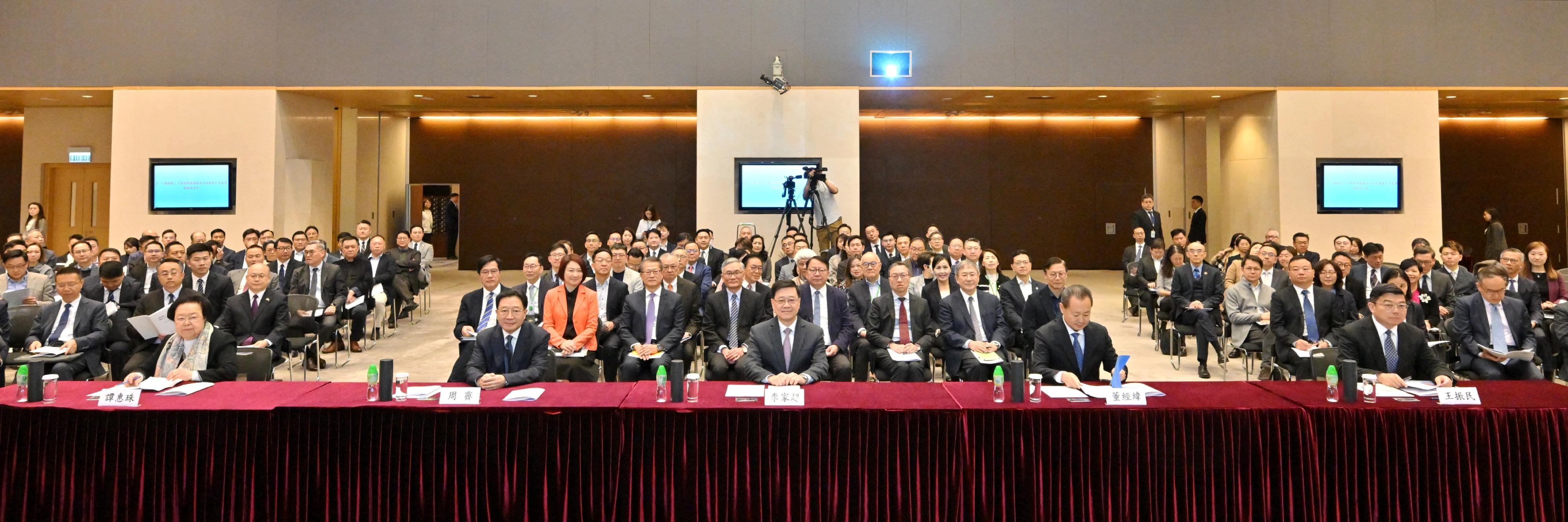 The Hong Kong Special Administrative Region (HKSAR) Government held a seminar on the white paper titled "Hong Kong: Safeguarding China's National Security Under the Framework of One Country, Two Systems" at the Central Government Offices this morning (February 14). Photo shows (front row, from left) former Vice-chairperson of the HKSAR Basic Law Committee of the Standing Committee of the National People's Congress, Dr Maria Tam; Deputy Director of the Hong Kong and Macao Work Office of the Communist Party of China Central Committee, ⁠Deputy Director of Hong Kong and Macao Affairs Office of the State Council, Director of the Liaison Office of the Central People's Government in the Hong Kong Special Administrative Region and National Security Adviser to the Committee for Safeguarding National Security of the HKSAR, Mr Zhou Ji; the Chief Executive and Chairman of the Committee for Safeguarding National Security of the HKSAR, Mr John Lee; Head of the Office for Safeguarding National Security of the Central People's Government in the HKSAR, Mr Dong Jingwei, and former Director-General of the First Bureau of the Hong Kong and Macao Work Office of the Communist Party of China Central Committee, Vice President of the Chinese Association of Hong Kong and Macao Studies and Professor of the School of Law of Tsinghua University, Professor Wang Zhenmin.