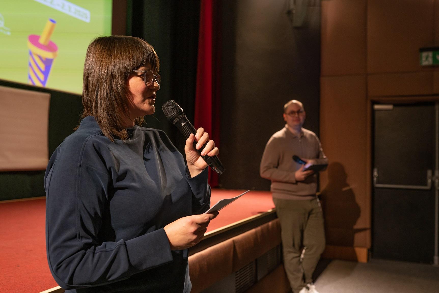 The Hong Kong Economic and Trade Office, Berlin (HKETO Berlin) supported the screening of Hong Kong films at the Filmasia Presents Festival in Brno, Czechia. Photo shows the Head of Public Relations of HKETO Berlin, Ms Stephanie Pall (left), speaking before the screening of the opening film "In the Mood for Love".