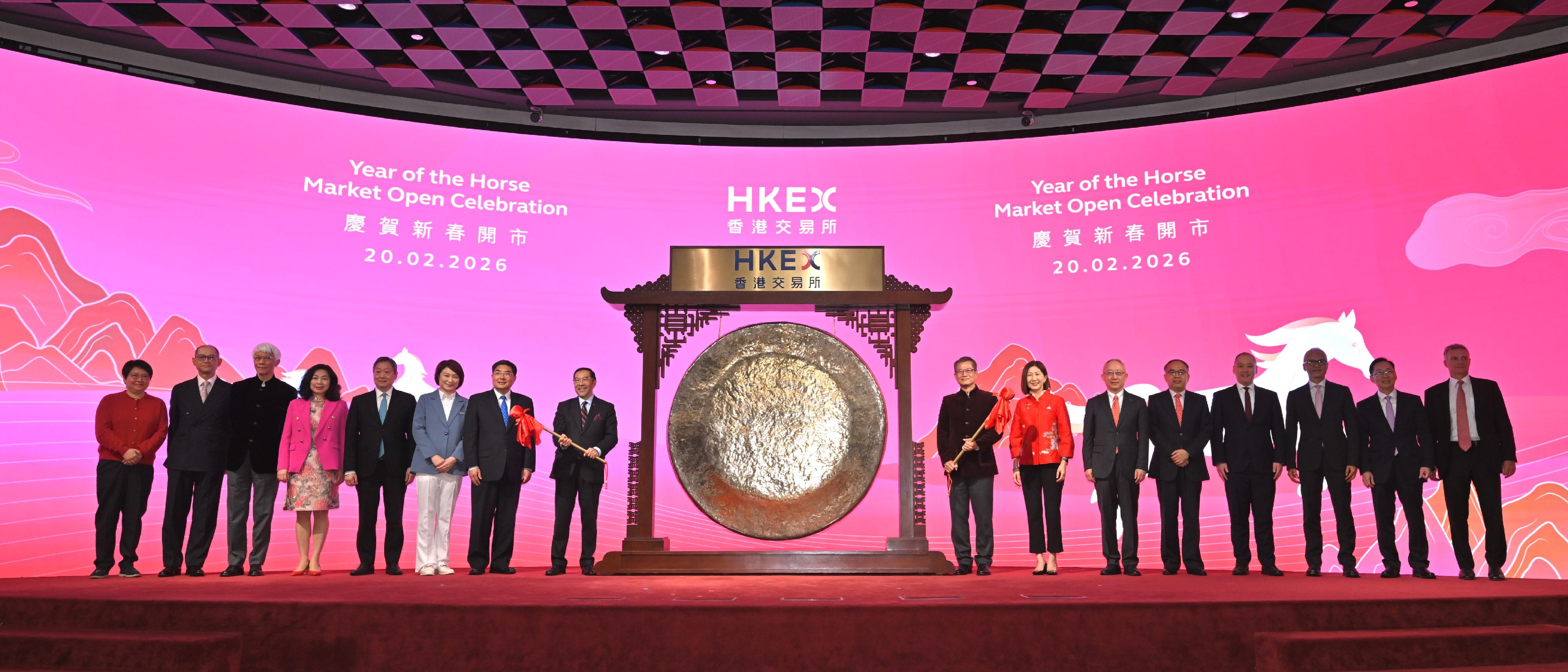 The Financial Secretary, Mr Paul Chan, attended the Year of the Horse Market Open Celebration Ceremony today (February 20). Photo shows (from fifth left) the Chairman of the Securities and Futures Commission, Dr Kelvin Wong; the President of the Legislative Council, Dr Starry Lee; Deputy Director of the Liaison Office of the Central People's Government in the Hong Kong Special Administrative Region (HKSAR) Mr Zhang Yong; the Chairman of the Hong Kong Exchanges and Clearing Limited (HKEX), Mr Carlson Tong;  Mr Chan; the Chief Executive Officer of the HKEX, Ms Bonnie Chan; Deputy Commissioner of the Office of the Commissioner of the Ministry of Foreign Affairs of the People's Republic of China in the HKSAR Mr Li Yongsheng; the Secretary for Financial Services and the Treasury, Mr Christopher Hui, and other guests officiating at the gong-striking ceremony.