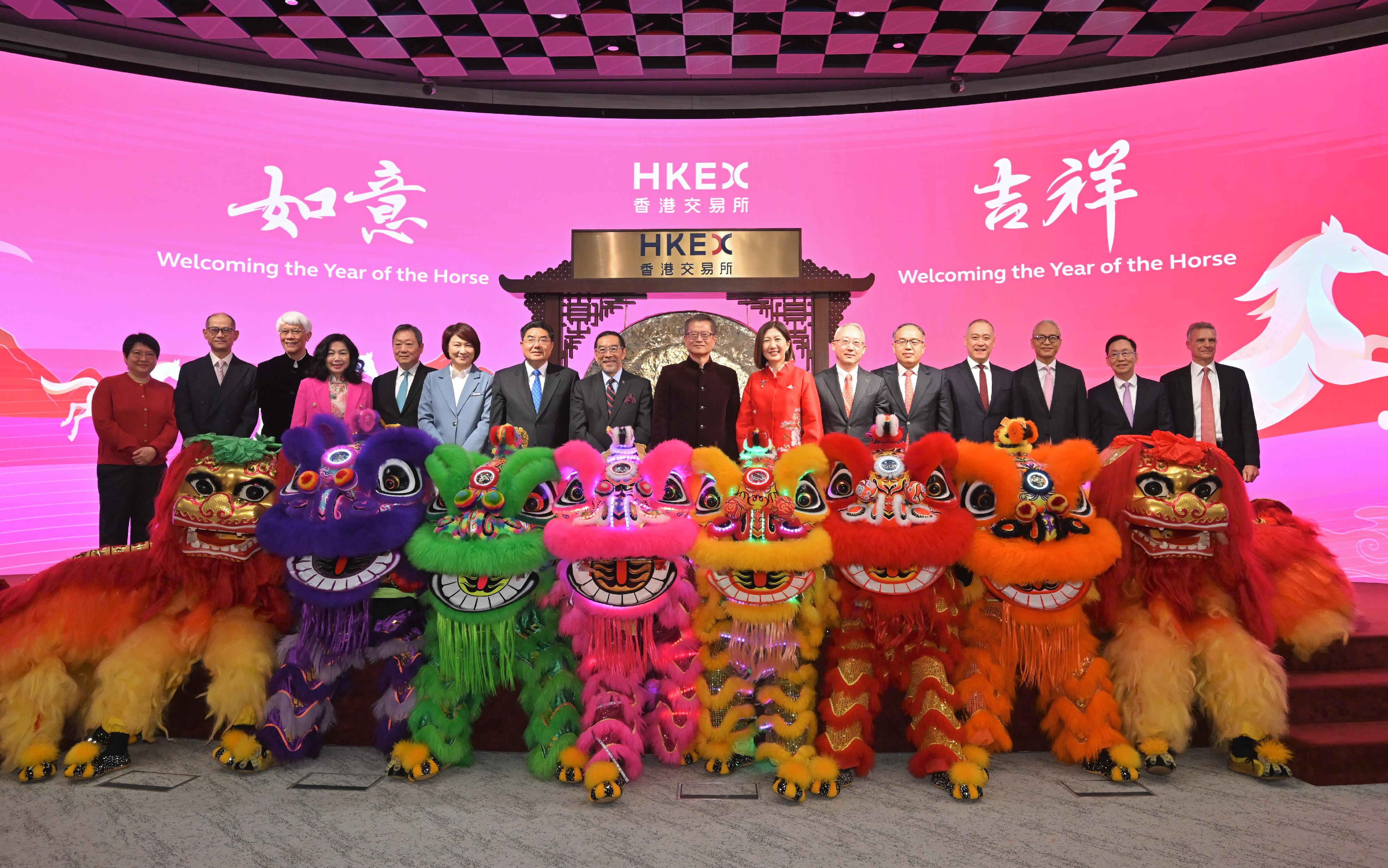 The Financial Secretary, Mr Paul Chan, attended the Year of the Horse Market Open Celebration Ceremony today (February 20). Photo shows (from fifth left) the Chairman of the Securities and Futures Commission, Dr Kelvin Wong; the President of the Legislative Council, Dr Starry Lee; Deputy Director of the Liaison Office of the Central People's Government in the Hong Kong Special Administrative Region (HKSAR) Mr Zhang Yong; the Chairman of the Hong Kong Exchanges and Clearing Limited (HKEX), Mr Carlson Tong;  Mr Chan; the Chief Executive Officer of the HKEX, Ms Bonnie Chan; Deputy Commissioner of the Office of the Commissioner of the Ministry of Foreign Affairs of the People's Republic of China in the HKSAR Mr Li Yongsheng; the Secretary for Financial Services and the Treasury, Mr Christopher Hui, and other guests at the ceremony.
