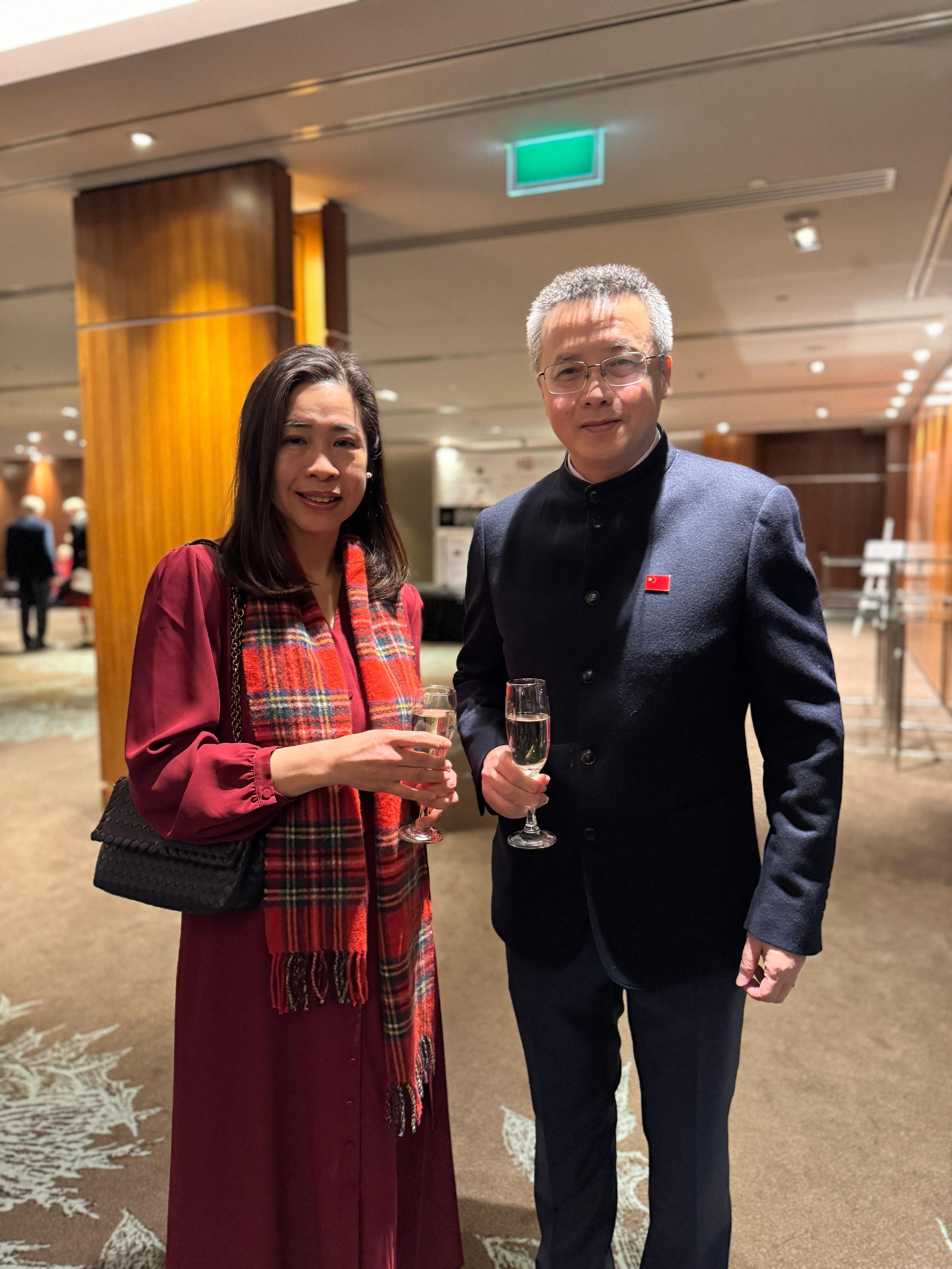 The Hong Kong Economic and Trade Office in London (London ETO), Invest Hong Kong, and the Hong Kong Trade Development Council supported the China-Britain Business Council to organise the Chinese Burns Supper in Edinburgh, Scotland on February 19 (Edinburgh time). Photo shows the Director-General of the London ETO, Miss Fiona Chau (left) and the Consul General of the People's Republic of China in Edinburgh, Mr Zhang Biao.