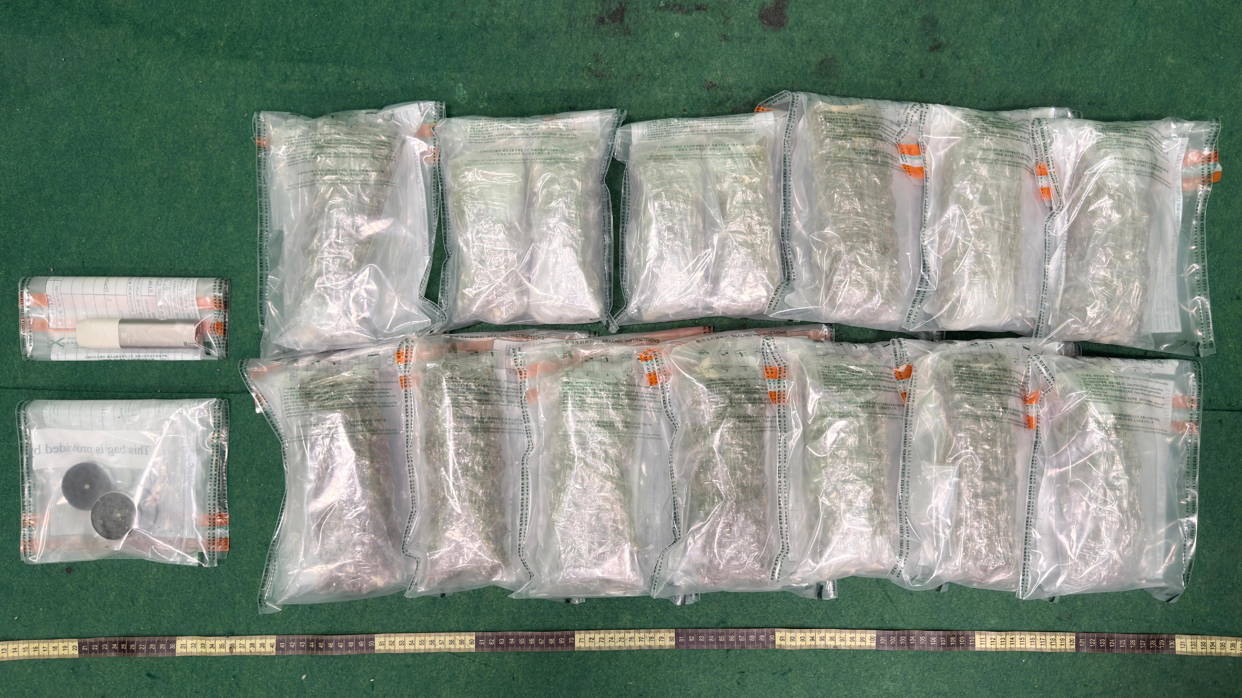 Hong Kong Customs today (February 21) detected one passenger drug trafficking case at Hong Kong International Airport and seized about 3 kilograms of suspected cannabis buds, a grinder containing traces of suspected cannabis buds and an alternative smoking product with a total estimated market value of about $0.6 million. One woman was arrested. Photo shows the suspected cannabis buds, grinder and alternative smoking product seized in the case.