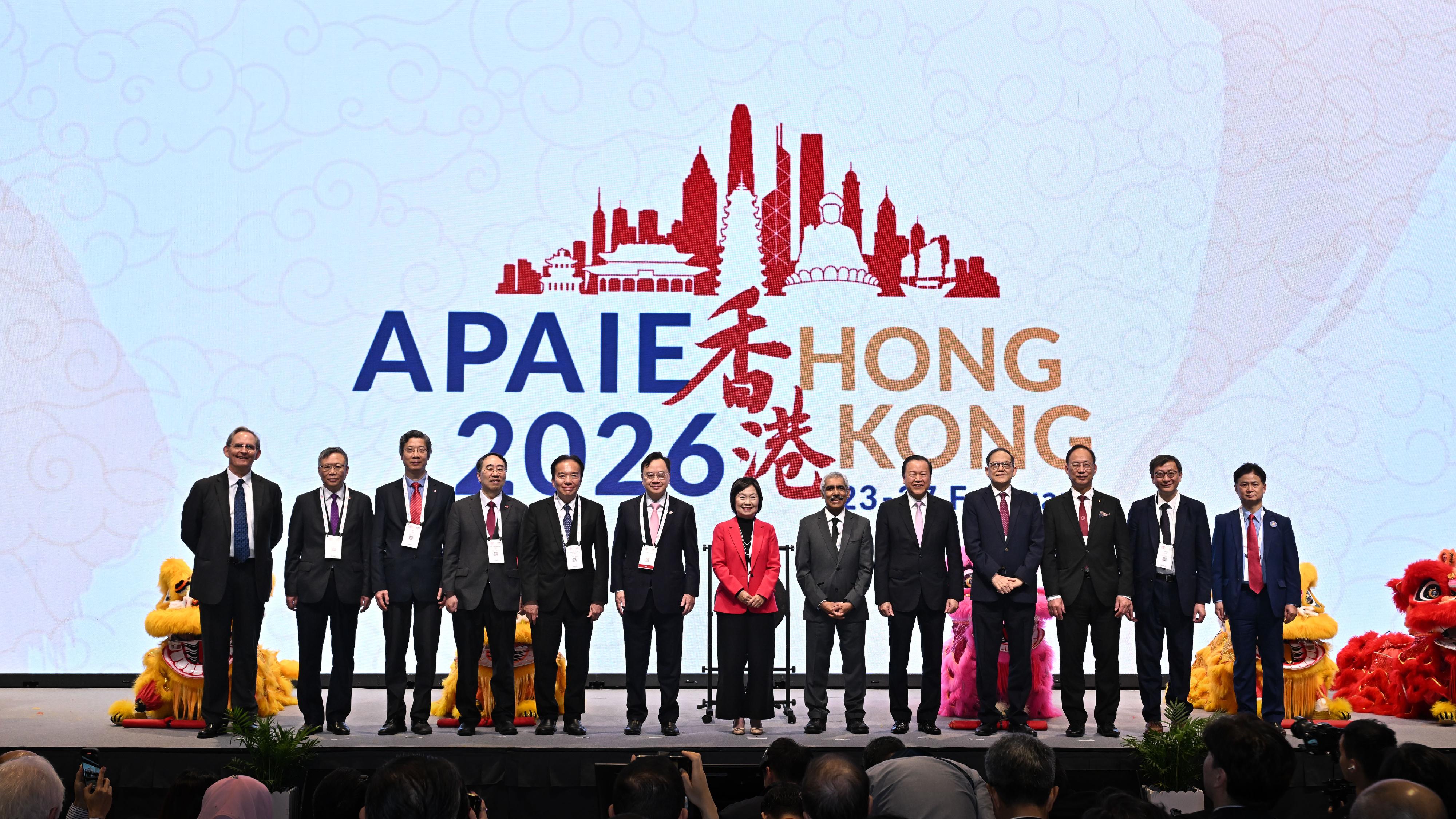 The opening ceremony of the Asia-Pacific Association for International Education (APAIE) 2026 Conference and Exhibition was held today (February 24). Photo shows the Secretary for Education, Dr Choi Yuk-lin (centre); the Convenor of the Heads of Universities Committee and Vice-Chancellor and President of the Chinese University of Hong Kong, Professor Dennis Lo (sixth left); and the President of the APAIE, Professor Venky Shankararaman (sixth right),  with other guests at the ceremony.