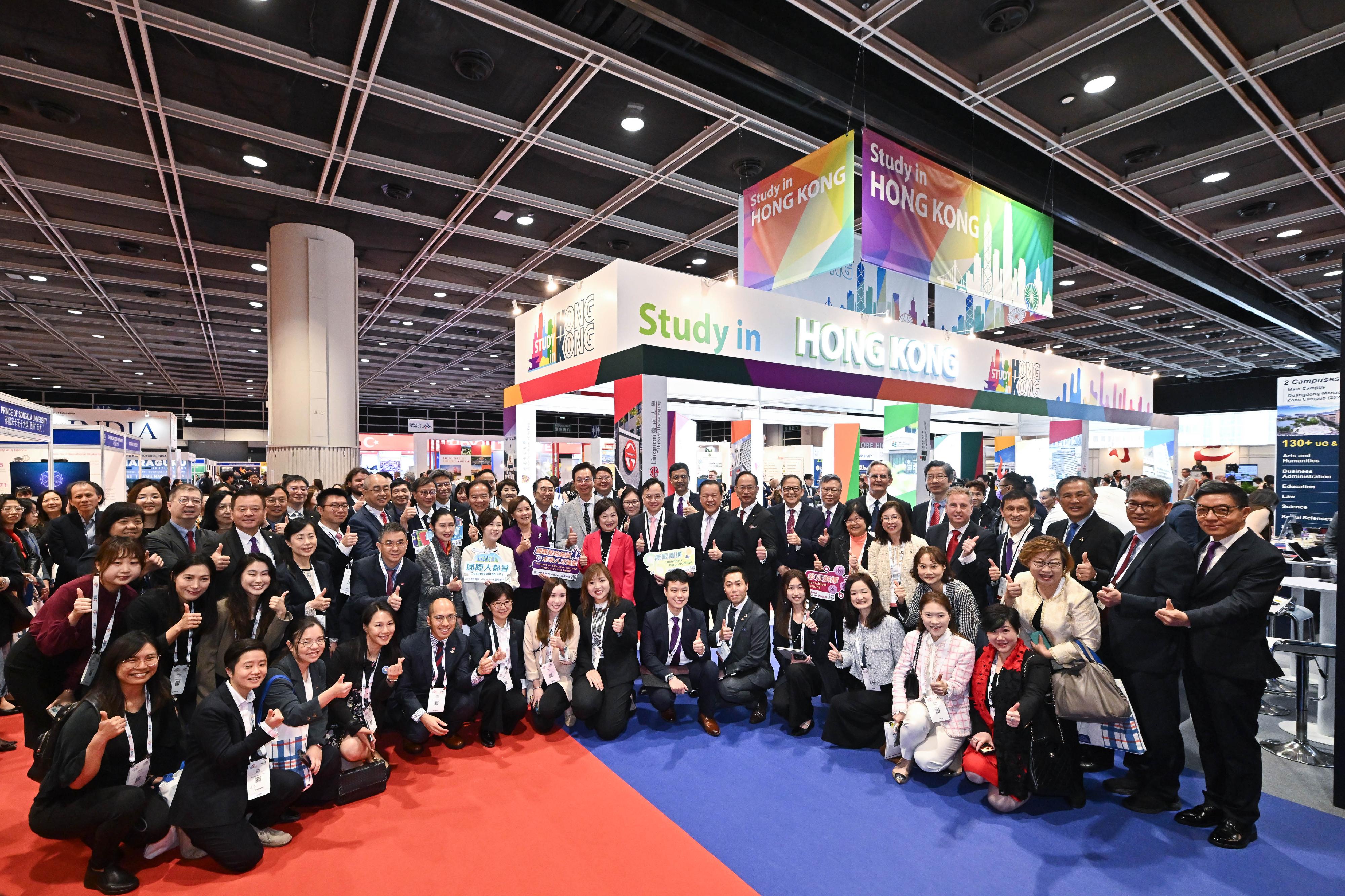 The opening ceremony of the Asia-Pacific Association for International Education 2026 Conference and Exhibition was held today (February 24). Photo shows the Secretary for Education, Dr Choi Yuk-lin (second row, ninth left), visiting the "Study in Hong Kong" Pavilion with other guests after the ceremony.