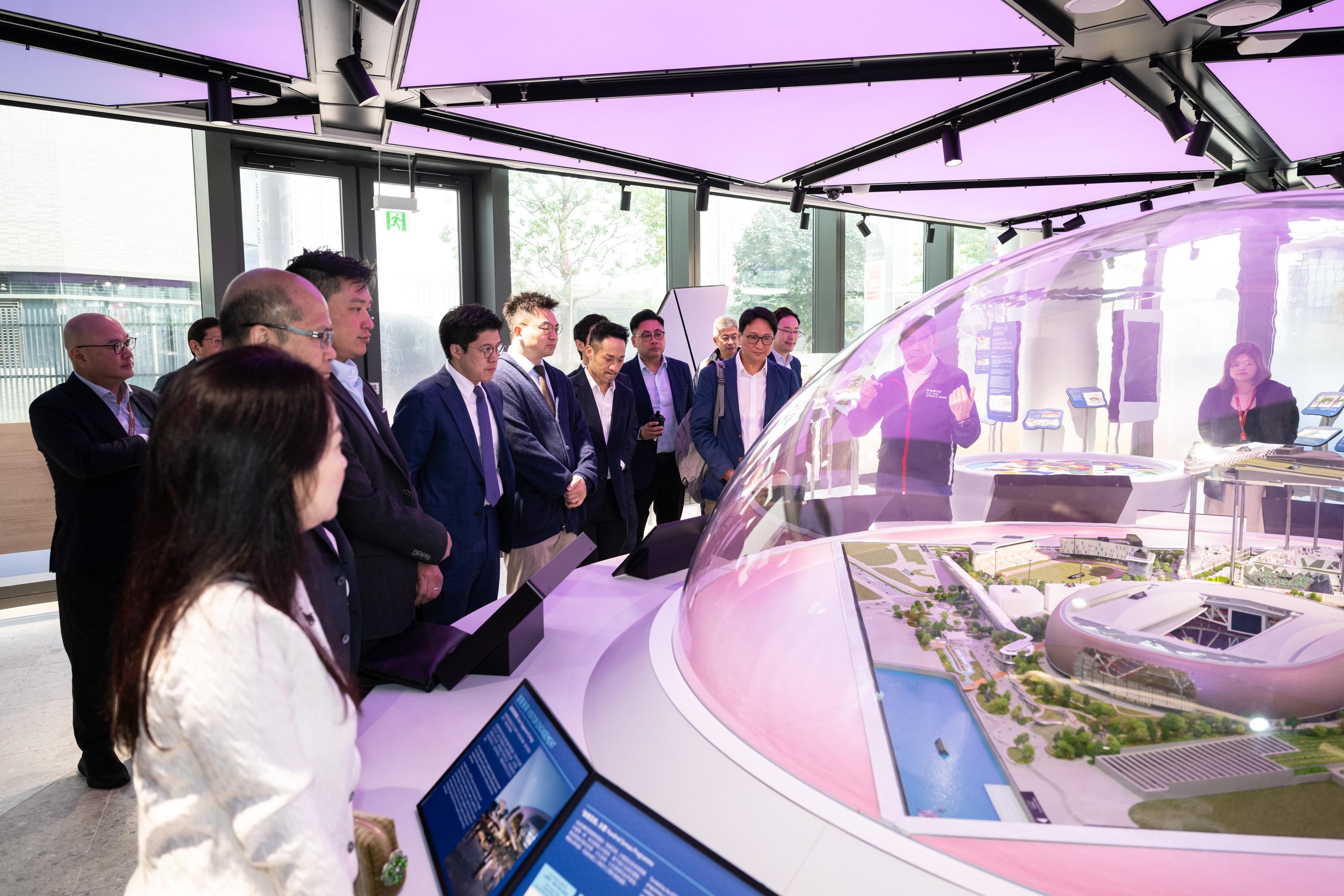 The Legislative Council (LegCo) Panel on Home Affairs, Culture and Sports visits the Kai Tak Sports Park (KTSP) today (February 24). Photo shows LegCo Members receiving a briefing from representatives of the KTSP Limited on the overall planning and core facilities of the KTSP.
