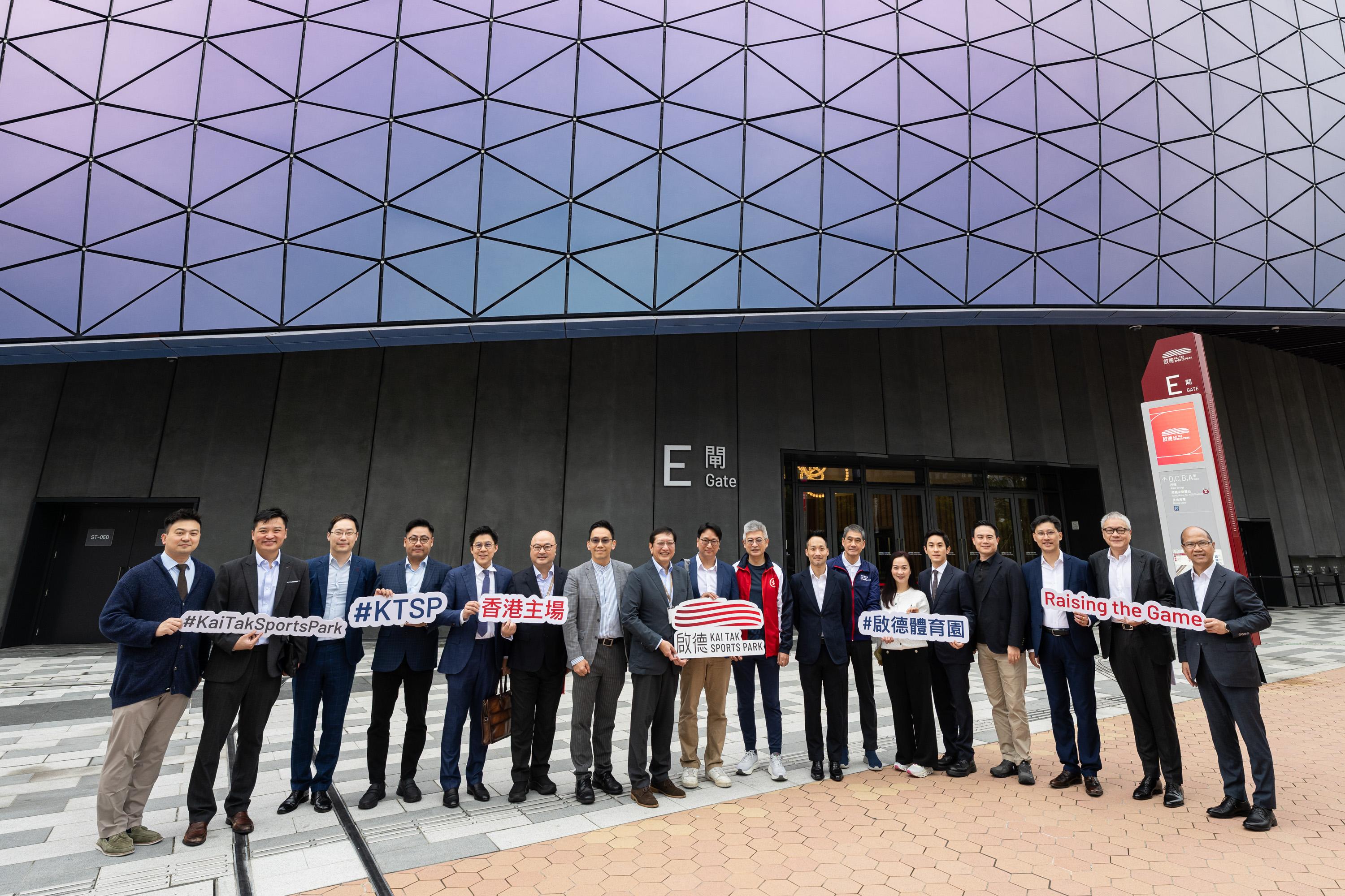 The Legislative Council (LegCo) Panel on Home Affairs, Culture and Sports visits the Kai Tak Sports Park (KTSP) today (February 24). Photo shows the Chairman of the Panel on Home Affairs, Culture and Sports, Mr Tang Ka-piu (ninth left), the Deputy Chairman, Mr Adrian Ho (eighth right), and other LegCo Members with the Under Secretary for Culture, Sports and Tourism, Mr Raistlin Lau (ninth right), the Commissioner for Sports, Mr George Tsoi (third left), and representatives of the KTSP Limited outside the Kai Tak Stadium.
