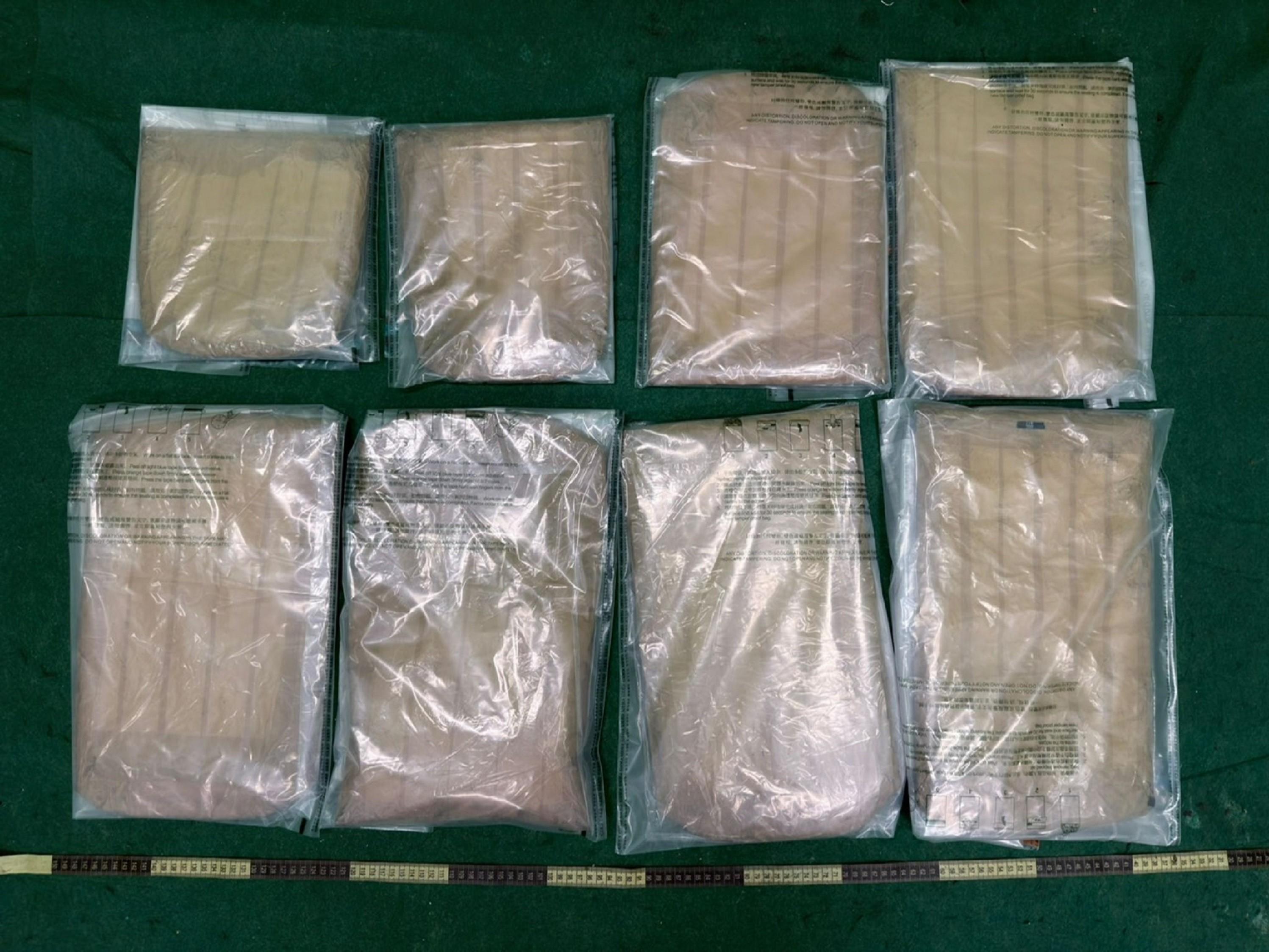 Hong Kong Customs detected a drug trafficking case involving an incoming air passenger at Hong Kong International Airport yesterday (February 24) and seized about 8 kilograms of suspected methamphetamine with an estimated market value of about $4.4 million. Photo shows the suspected methamphetamine seized.