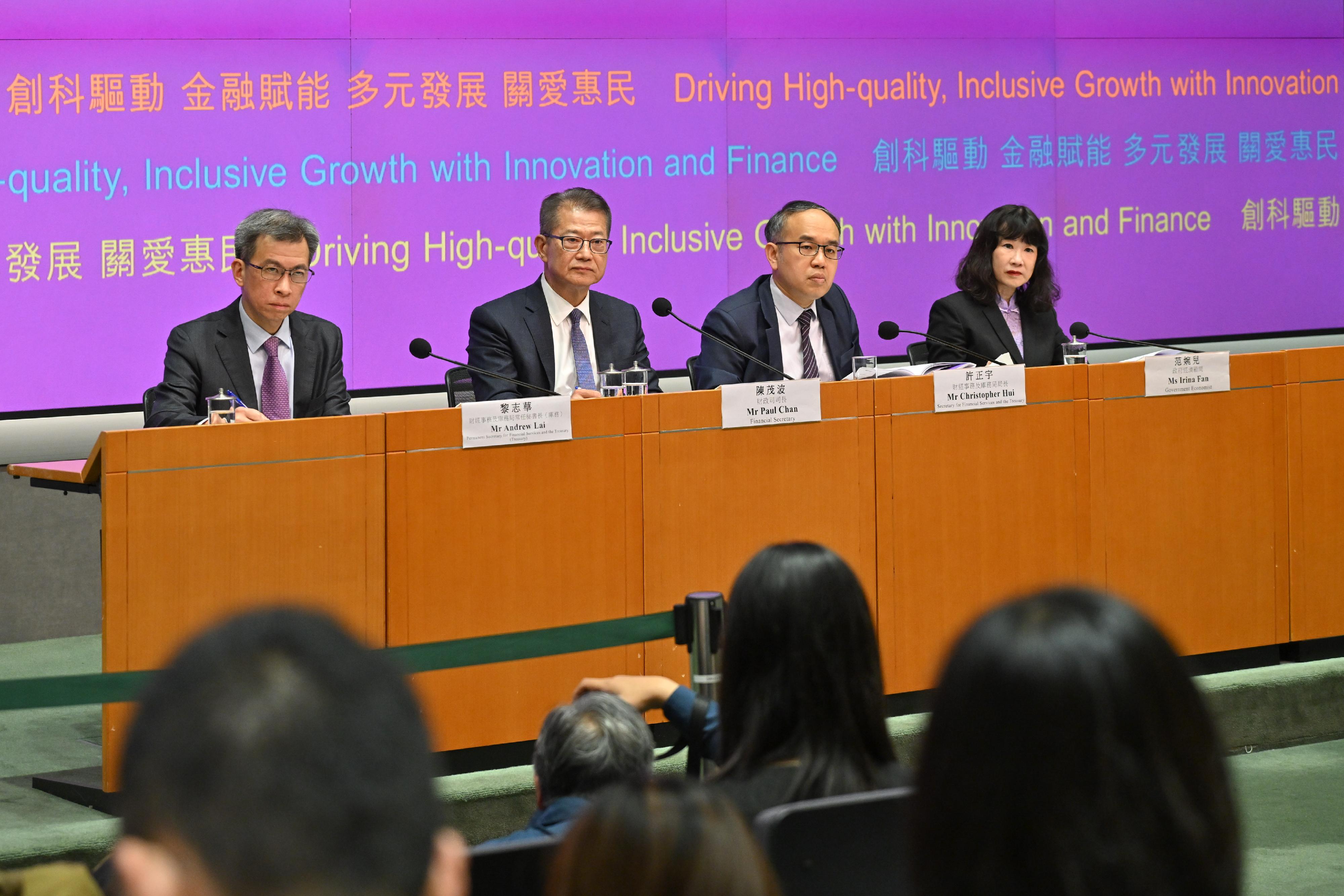 The Financial Secretary, Mr Paul Chan (second left), holds a press conference on the 2026-27 Budget this afternoon (February 25) at the Central Government Offices in Tamar and responds to questions.