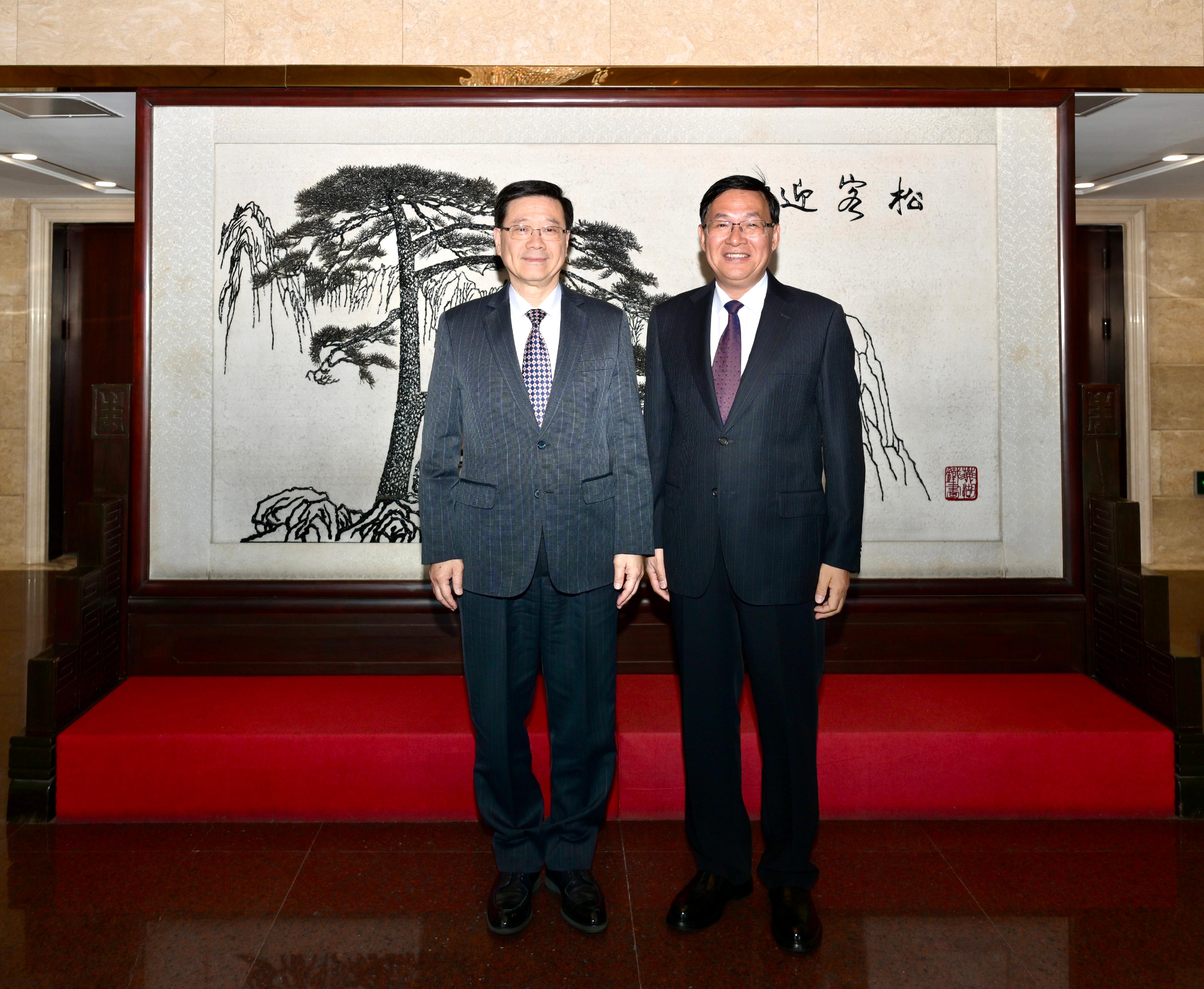 The Chief Executive, Mr John Lee (left), meets with the Chairman of the State-owned Assets Supervision and Administration Commission of the State Council, Mr Zhang Yuzhuo (right), in Beijing today (March 3).