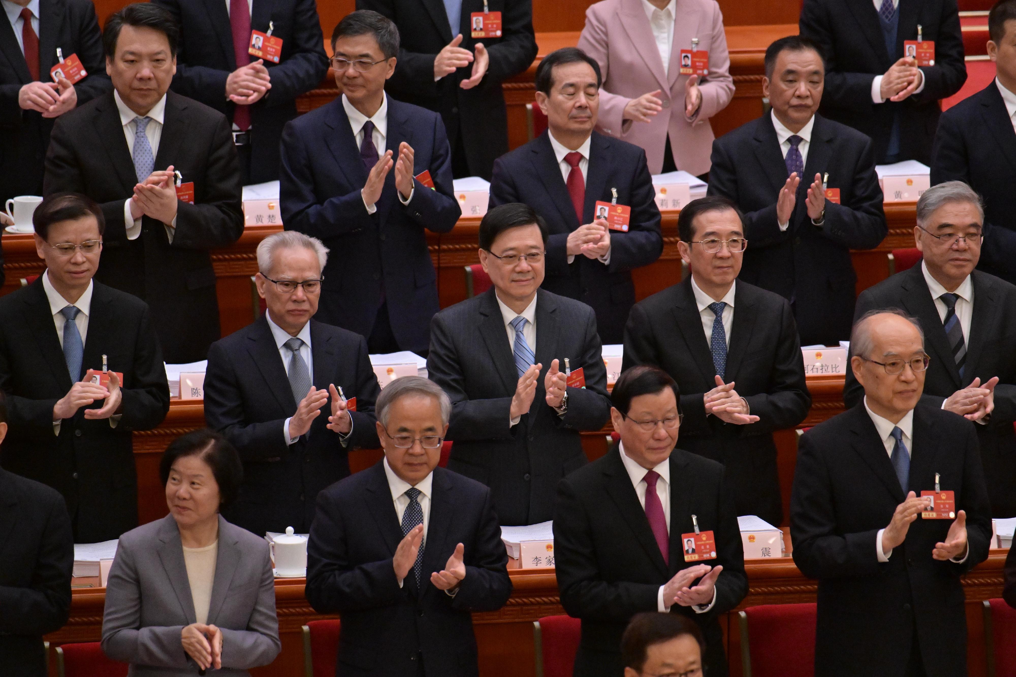 The Chief Executive, Mr John Lee (second row, centre), attends the opening meeting of the fourth annual session of the 14th National People's Congress in Beijing today (March 5).