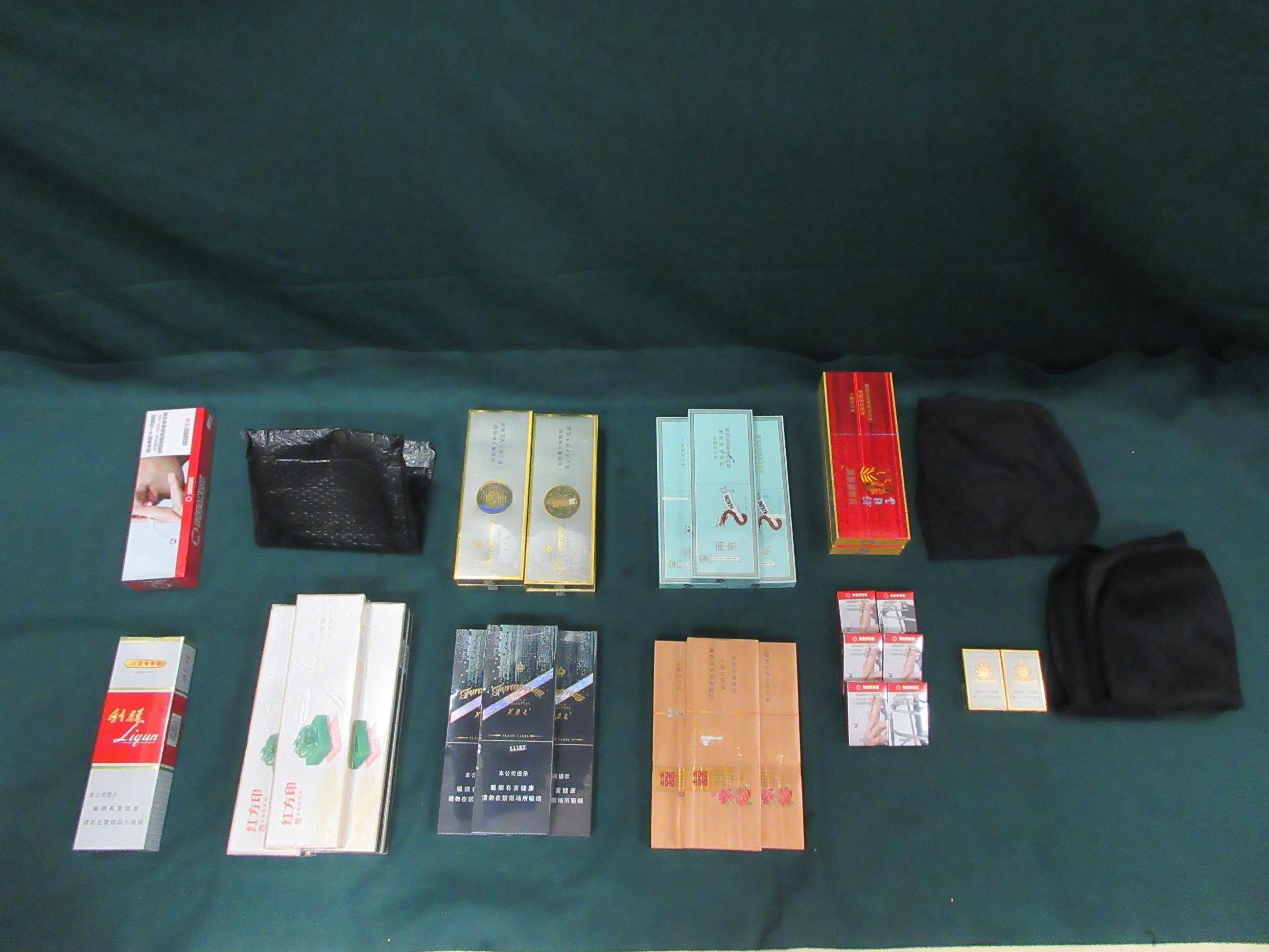 An incoming male passenger was sentenced to two months' imprisonment and fined $1,000 by the Fanling Magistrates' Courts today (March 9) for possessing duty-not-paid cigarettes and failing to declare them to Customs officers, in contravention of the Dutiable Commodities Ordinance. Photo shows the duty-not-paid cigarettes seized.
