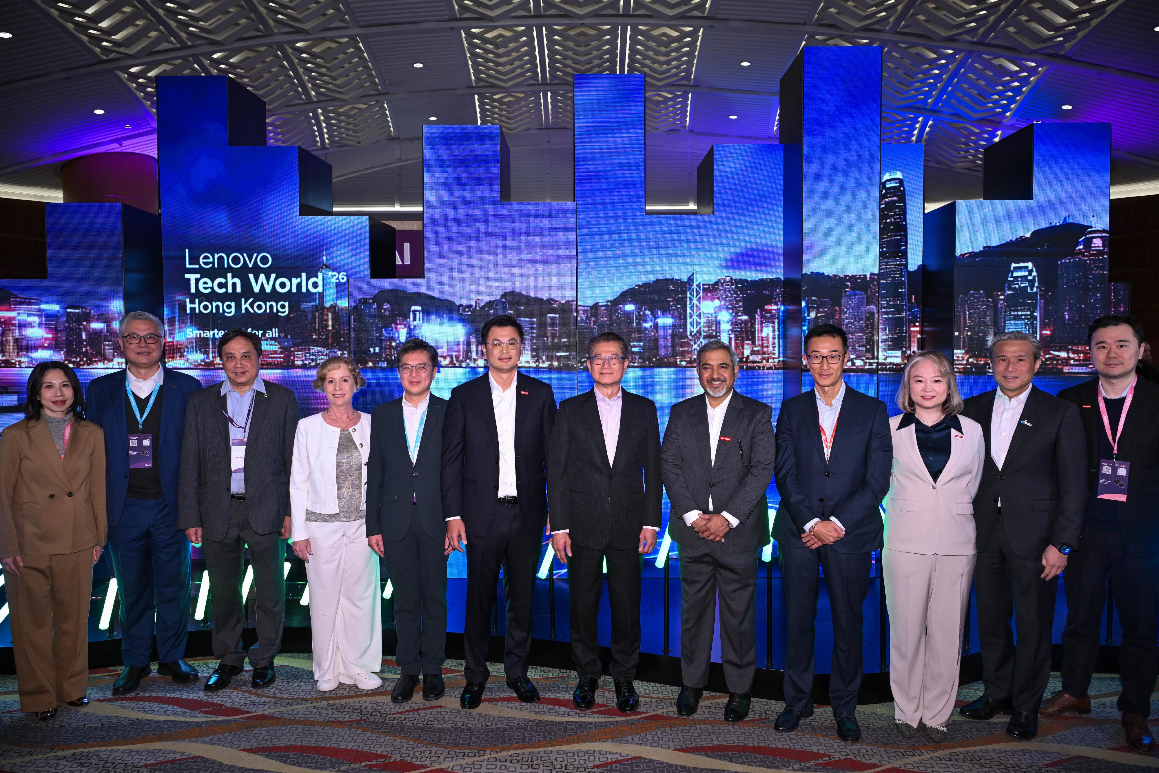 The Financial Secretary, Mr Paul Chan, attended Lenovo Tech World '26 Hong Kong today (March 10). Photo shows Mr Chan (sixth right), Executive Vice President of Lenovo and the President of Lenovo Solutions &  Services Group, Mr Ken Wong (sixth left), and other guests at the event.