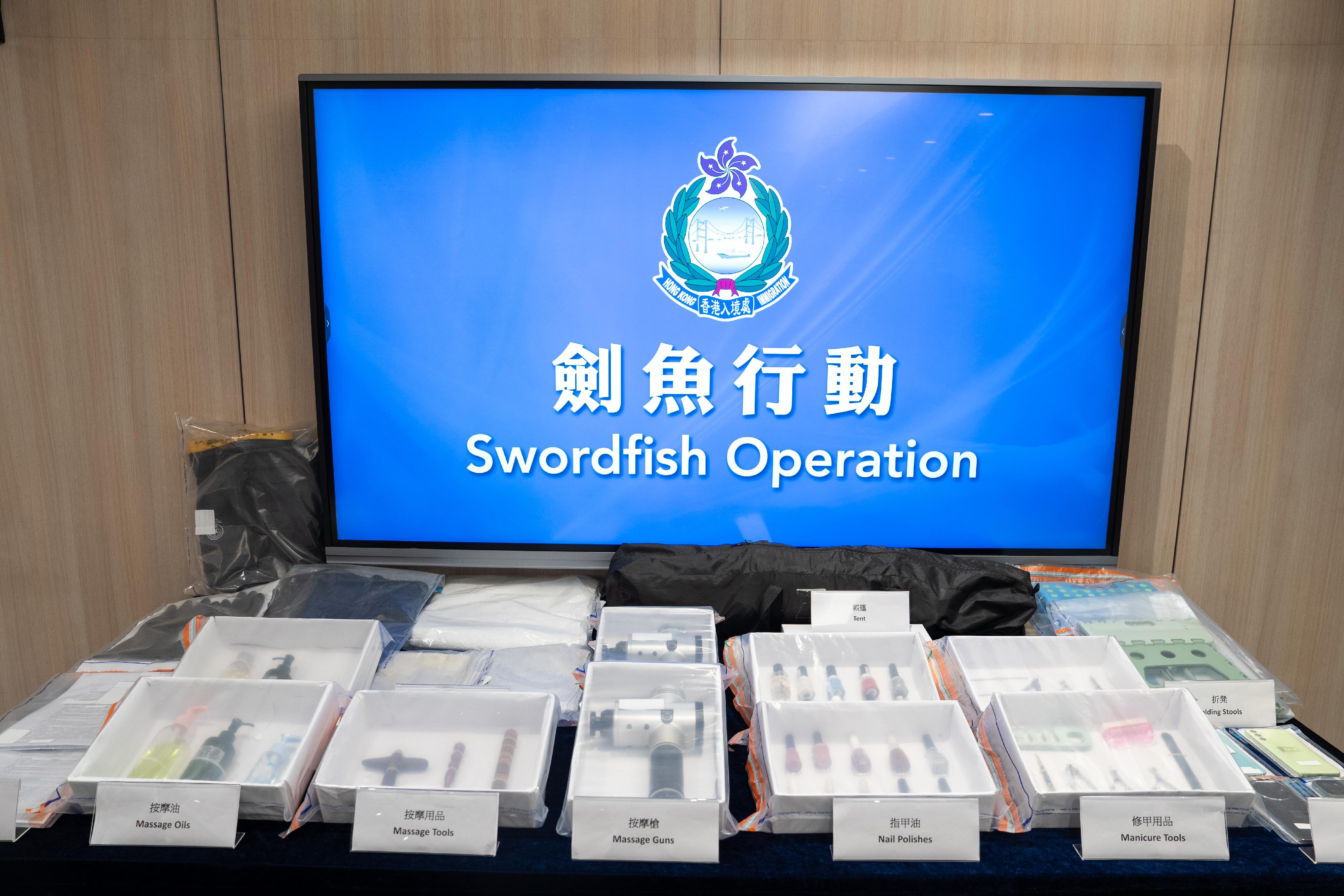 The Immigration Department conducted a series of territory-wide anti-illegal worker operations codenamed "Swordfish" for three consecutive days from March 8 to 10. Photo shows the items seized during the operations.