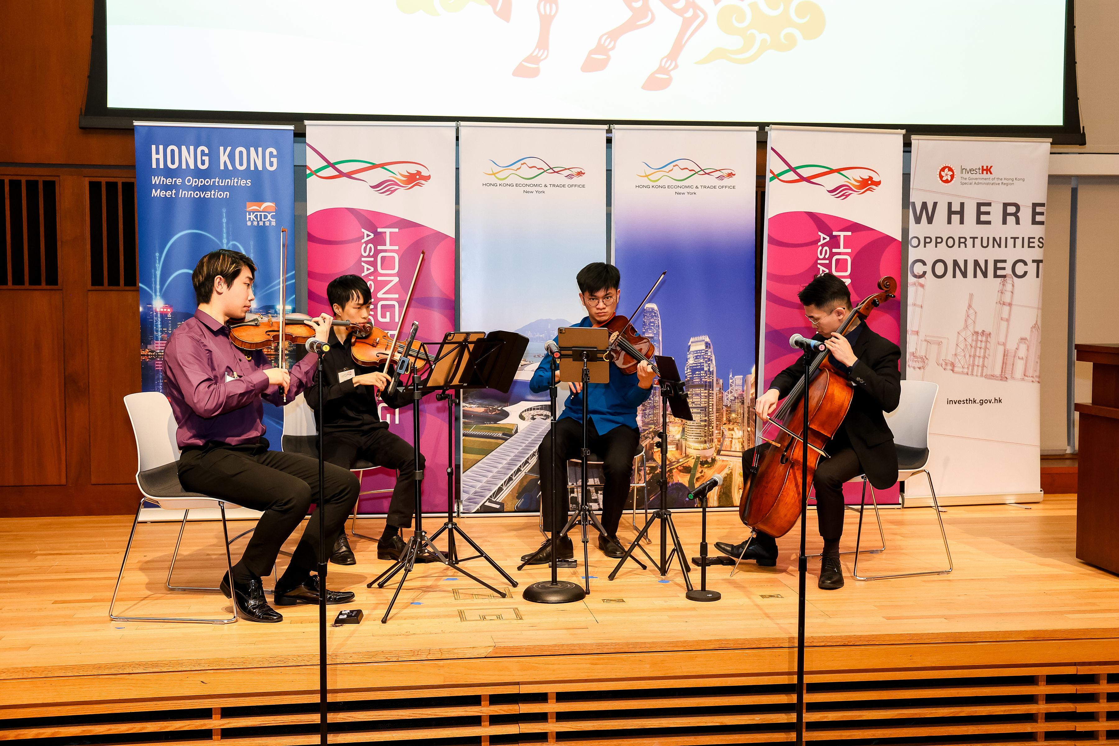 The Hong Kong Economic and Trade Office, New York (New York ETO) hosted a business forum and spring reception in Philadelphia on March 12 (Philadelphia time). Photo shows talented New York-based young musicians from Hong Kong performing at the reception.