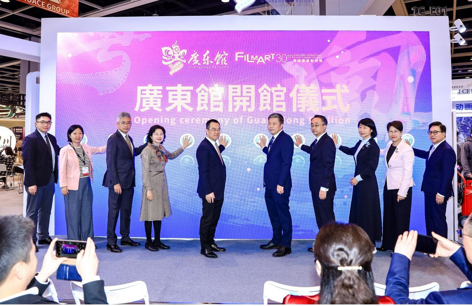This year's Hong Kong International Film & TV Market has exhibitors coming from a wide range of countries and regions, including provinces and cities in Chinese Mainland, as well as major film organisations from overseas and leading film companies in Hong Kong. Photo shows the Under Secretary for Culture, Sports and Tourism, Mr Raistlin Lau (third left); the Chairman of the Hong Kong Film Development Council, Dr Wilfred Wong (first right), attending the opening ceremony of the Guangdong Pavilion this afternoon (March 17).