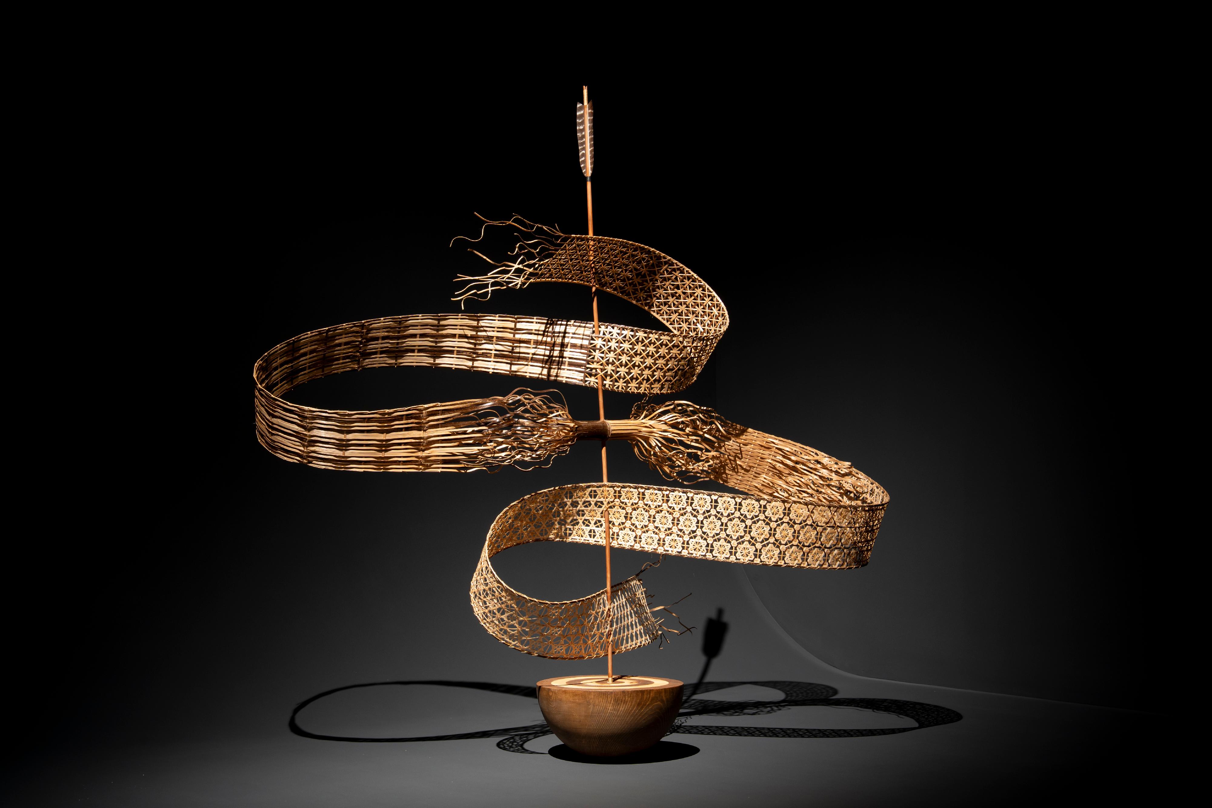 The Hong Kong Museum of Art is staging the "Live: Hong Kong Art Exhibition" starting from tomorrow (March 20), featuring artworks from 19 artists who are actively shaping the city's contemporary art scene. Photo shows artist Inkgo Lam&rsquo;s bamboo sculpture "Arrow (1)" .
