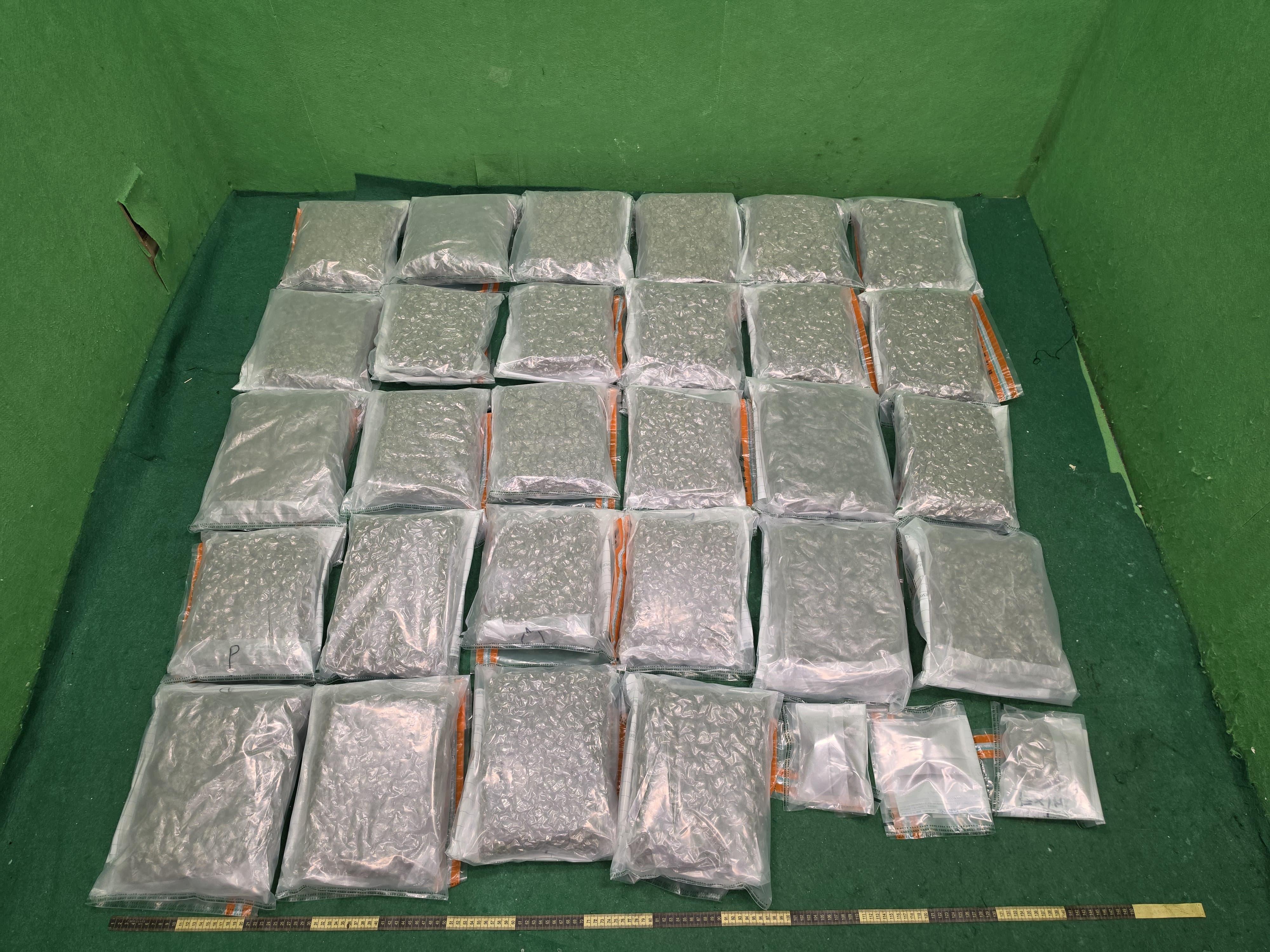 Hong Kong Customs yesterday (March 18) detected two passenger drug trafficking cases at Hong Kong International Airport and seized about 29 kilograms of suspected cannabis buds with a total estimated market value of about $6 million. Two men were arrested. Photo shows one batch of the suspected cannabis buds seized.

