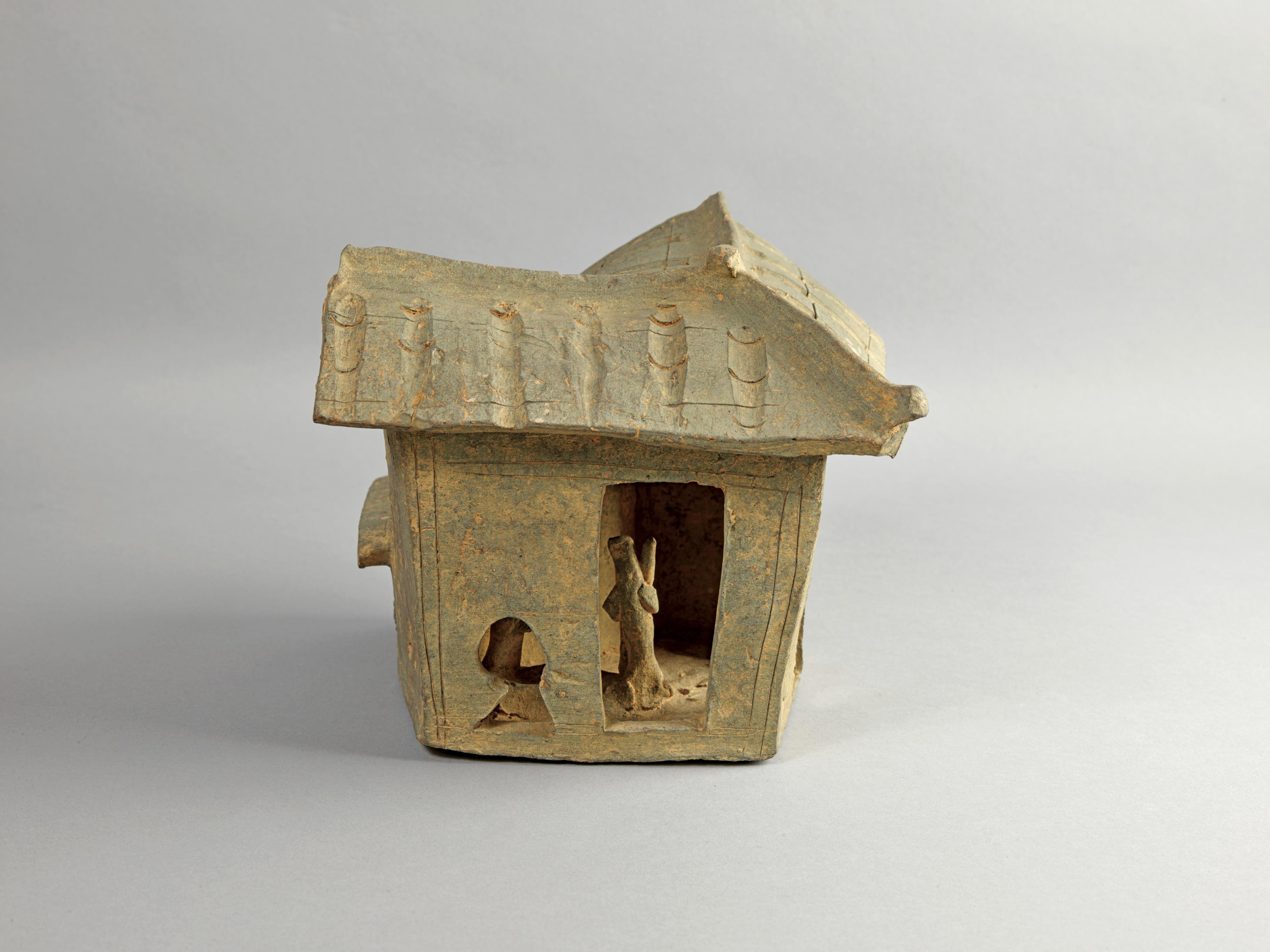 The opening ceremony of the exhibition titled &ldquo;The Majestic Han: A Golden Age of Vigour and Cultural Integration&rdquo; was held today (March 19) at the Hong Kong Heritage Discovery Centre. Photo shows a pottery house unearthed at Lei Cheng Uk Han Tomb in Hong Kong.