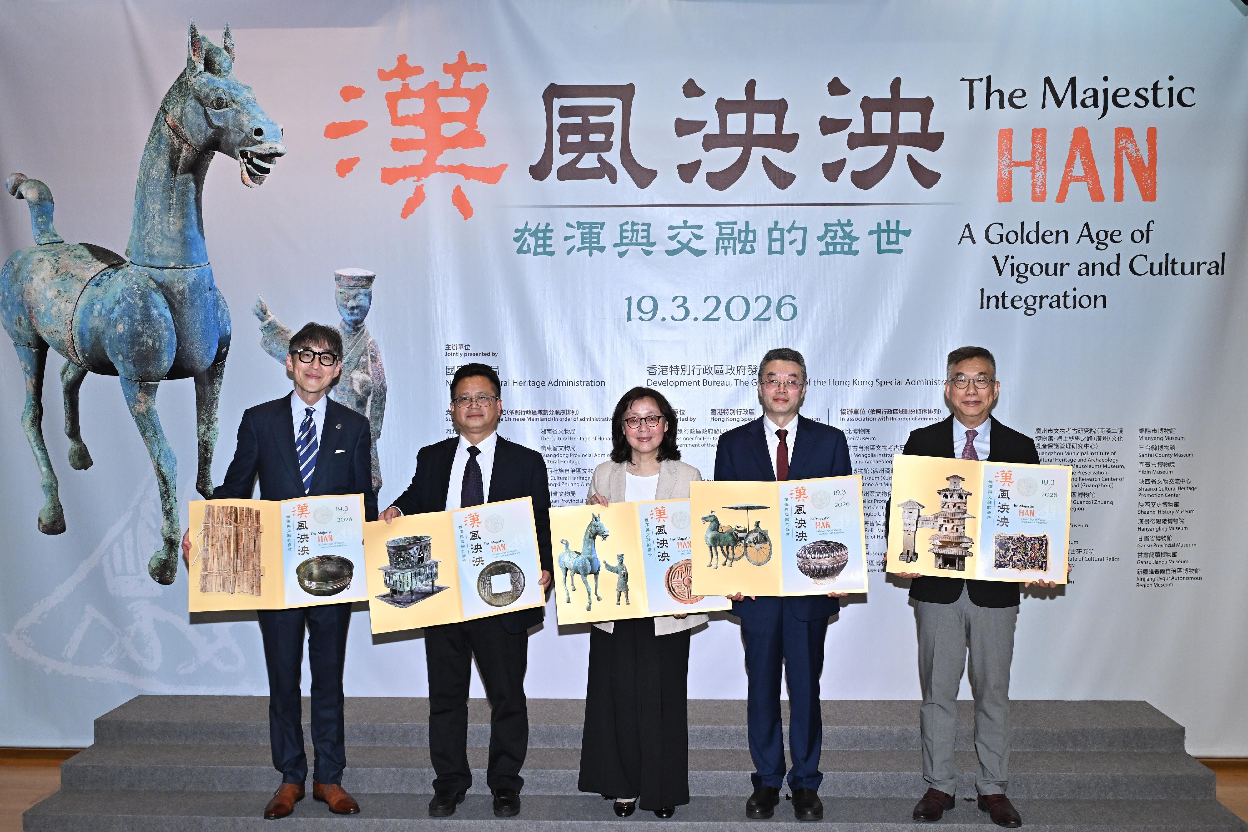 The opening ceremony of the exhibition titled &ldquo;The Majestic Han: A Golden Age of Vigour and Cultural Integration&rdquo; was held today (March 19) at the Hong Kong Heritage Discovery Centre. Photo shows the Secretary for Development, Ms Bernadette Linn (centre); the Director of Art Exhibitions China, Mr Tan Ping (second right); the Second-level Inspector of the Department of Publicity, Cultural and Sports Affairs of the Liaison Office of the Central People&rsquo;s Government in the Hong Kong Special Administrative Region, Mr Chen Xinyu (second left); the Chairman of the Antiquities Advisory Board, Professor Desmond Hui (first right); and the Chairman of the Advisory Committee on Built Heritage Conservation, Professor Douglas So (first left), officiating at the opening ceremony.