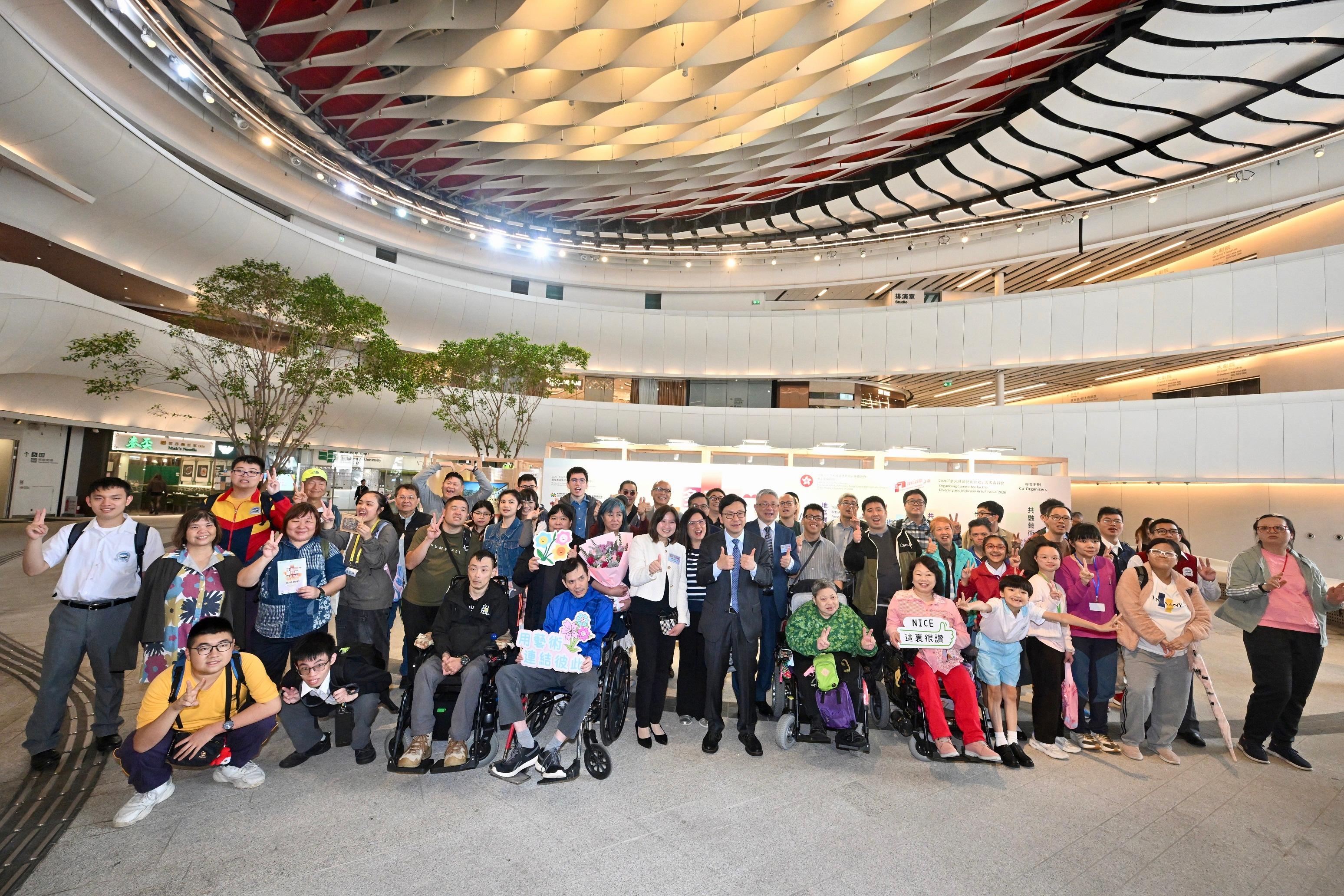 The Secretary for Labour and Welfare, Mr Chris Sun, officiated at the opening ceremony of the Diversity and Inclusion Arts Festival 2026 today (March 20). Photo shows Mr Sun (first row, eighth right) with artists with disabilities and participants during his visit to the inclusive arts exhibition.