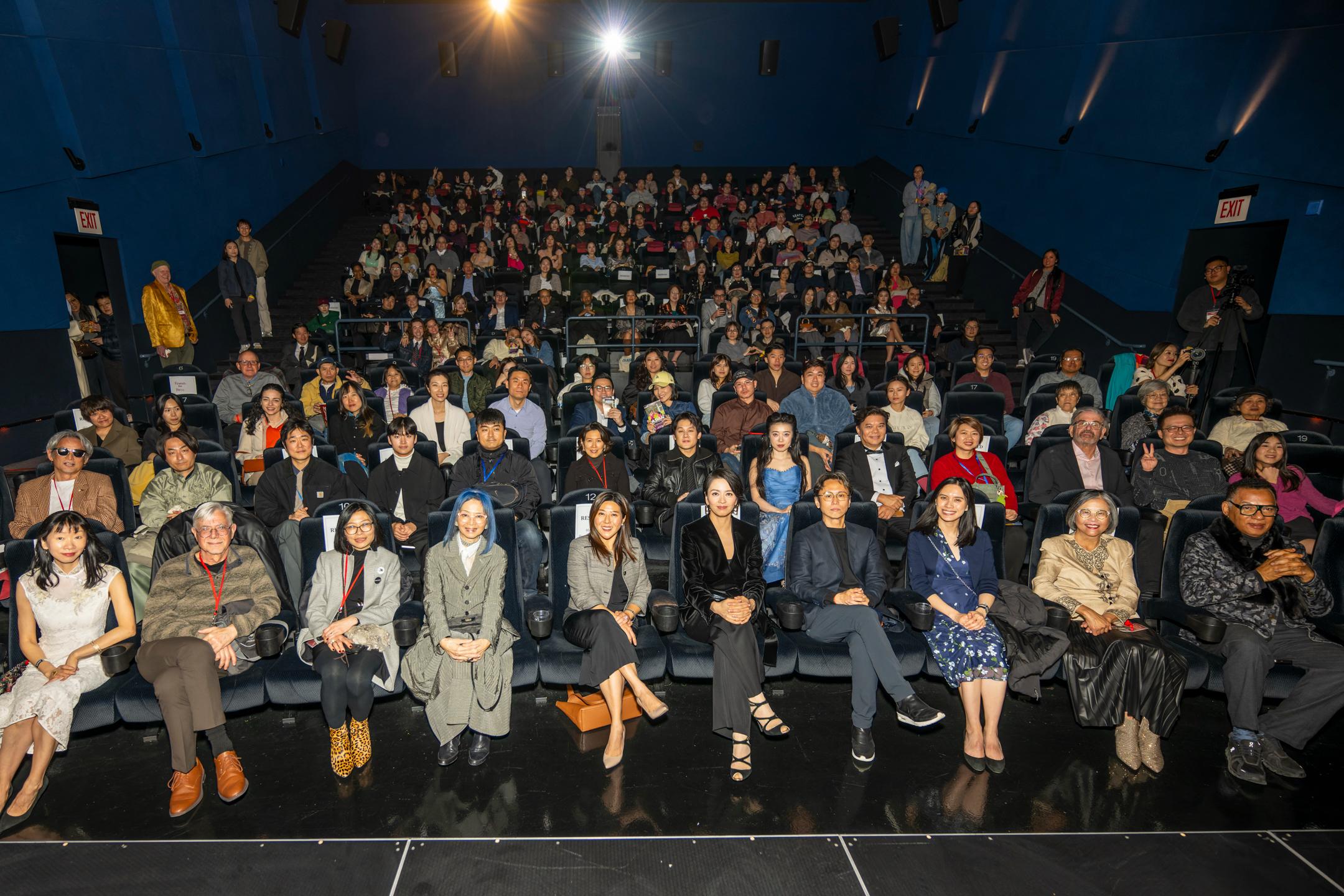 The Hong Kong Economic and Trade Office in New York (New York ETO) supported the 20th edition of the Asian Pop-up Cinema (APUC) film festival in Chicago by showcasing seven exceptional Hong Kong movies. Photo shows the Director of the New York ETO, Ms Maisie Ho (first row, fifth left); APUC's Extraordinary Actors Award honouree Gigi Leung (first row, fifth right); Hong Kong film director Jil Wong (first row, fourth right); and other officiating guests with the audience during the US premiere of "Pass and Goal" on March 20 (Chicago time).