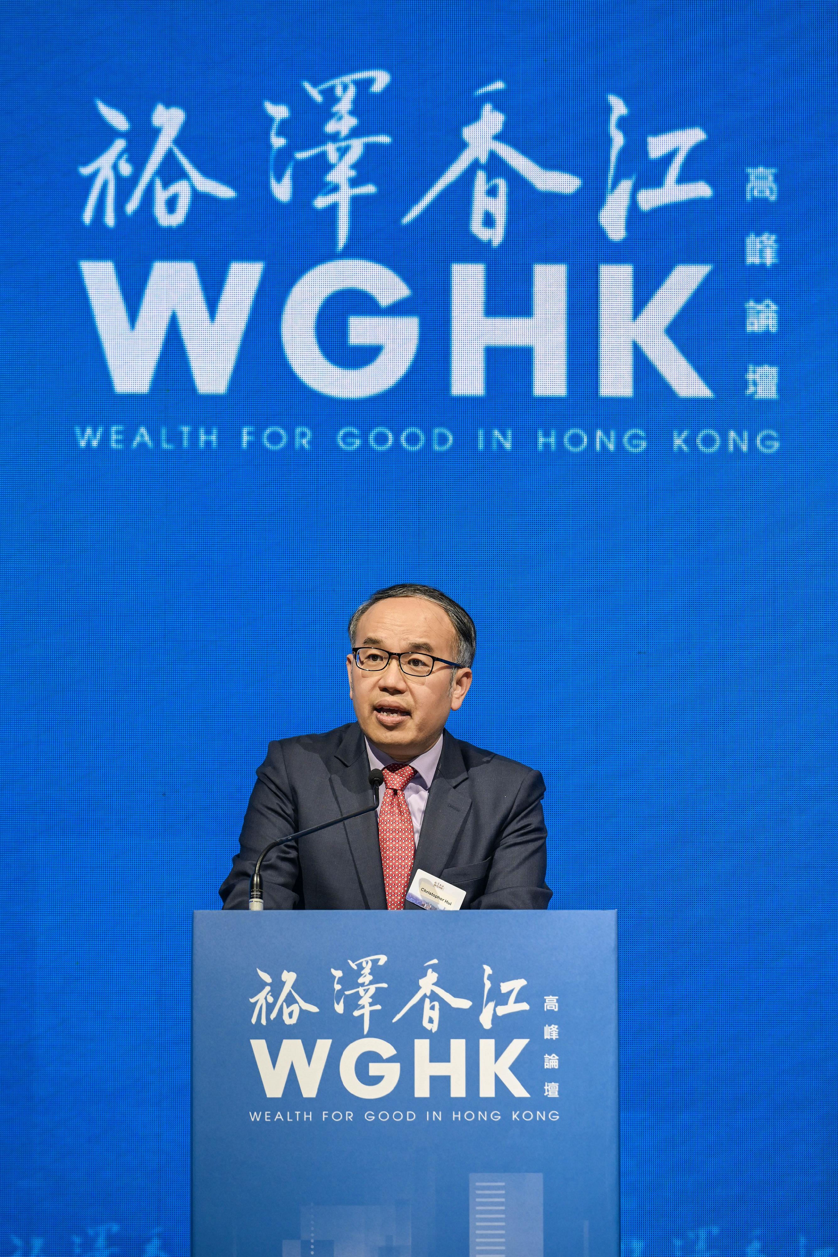 The Secretary for Financial Services and the Treasury, Mr Christopher Hui, delivers his remarks at the fourth edition of the Wealth for Good in Hong Kong Summit today (March 24).