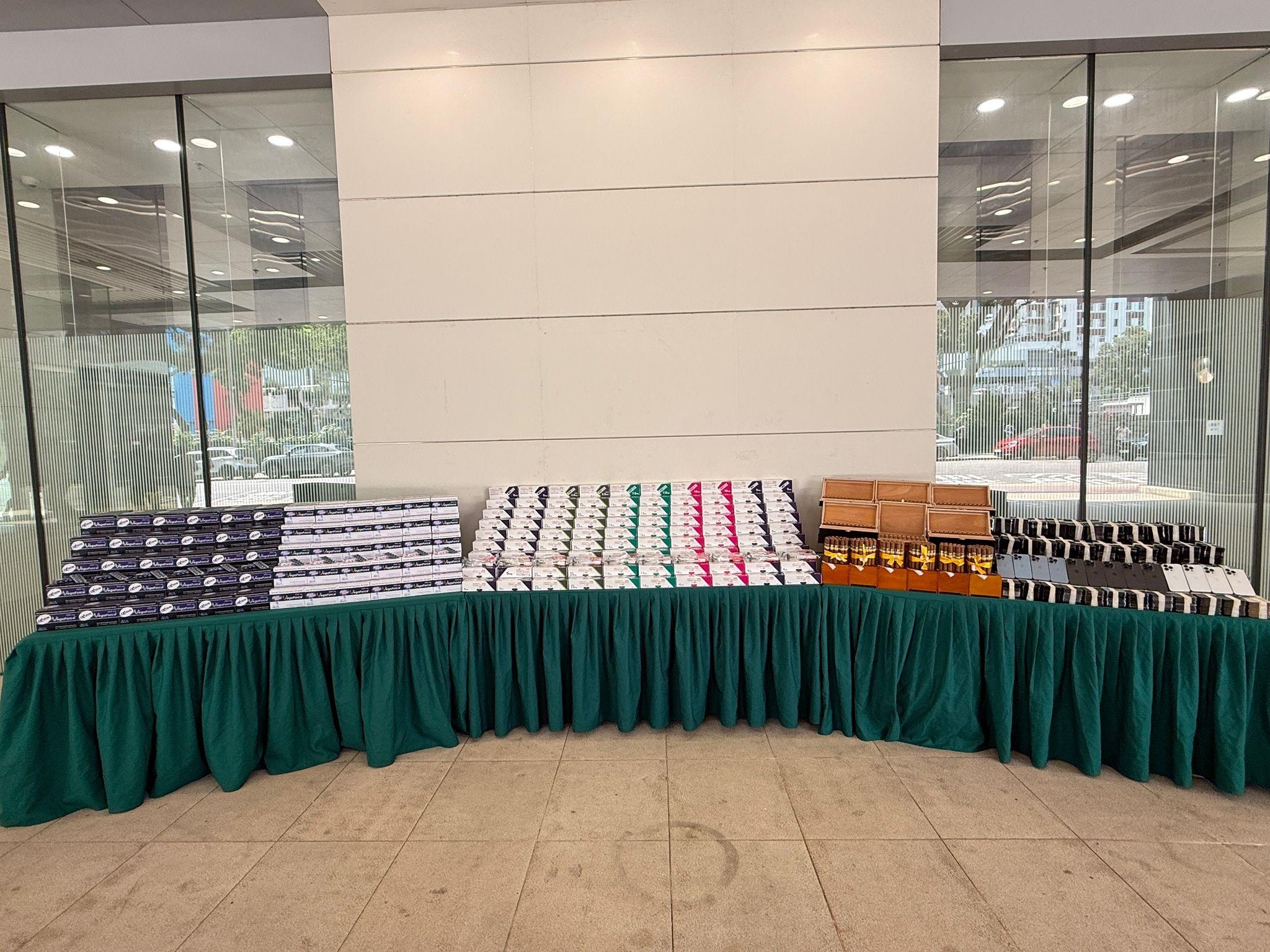 Hong Kong Customs detected a suspected smuggling case involving a river trade vessel on March 18. Large batches of suspected smuggled goods with a total estimated market value of about $71 million were seized. Photo shows the suspected smuggled goods seized.