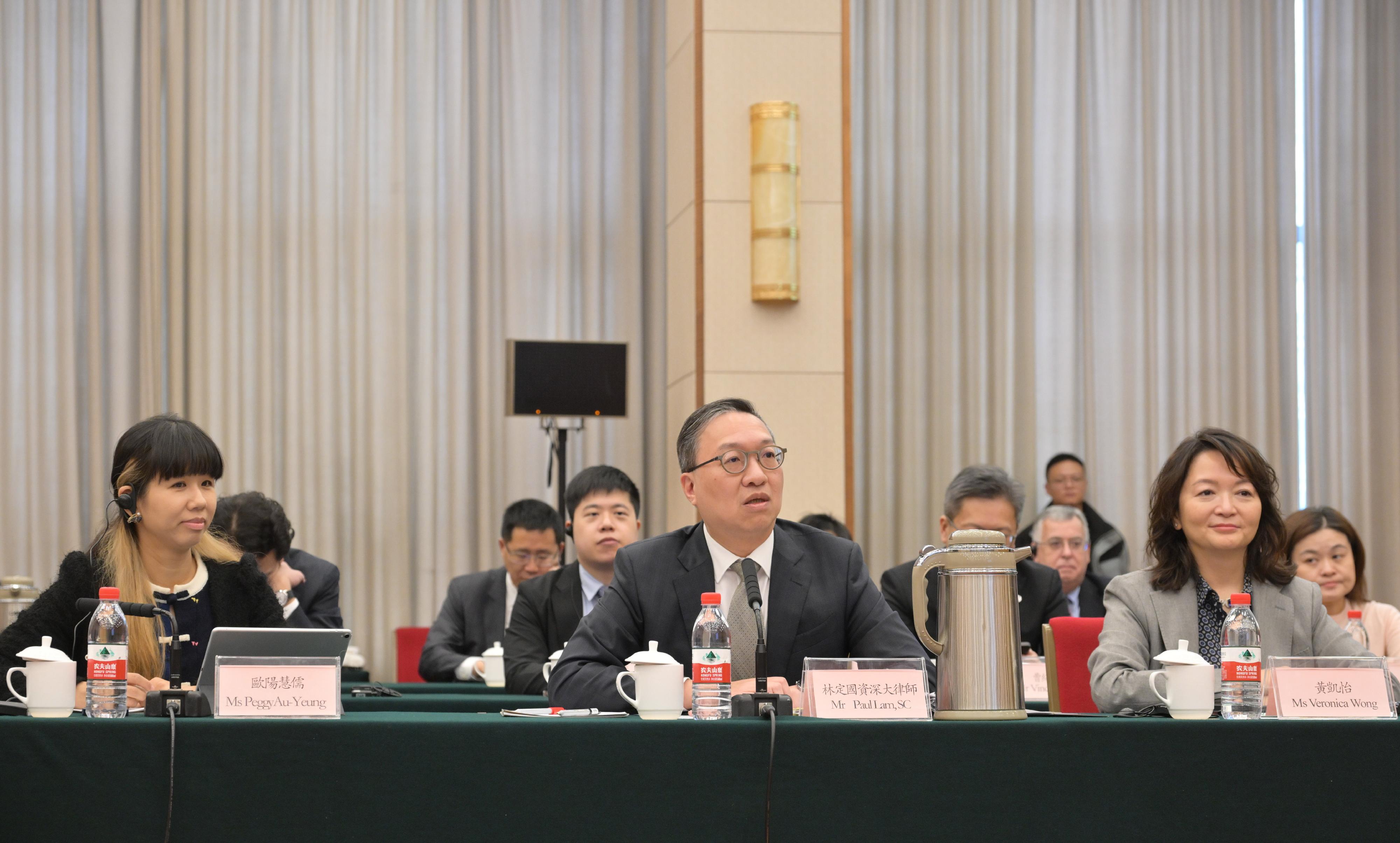 The Secretary for Justice, Mr Paul Lam, SC, together with his delegation, attended an exchange session with representatives of the Zhejiang legal community today (March 25). Photo shows Mr Lam (centre); the Director of the Hong Kong Economic and Trade Office in Shanghai of the Government of the Hong Kong Special Administrative Region, Ms Veronica Wong (right); and the Principal Government Counsel of the Legal Enhancement and Development Office of the Department of Justice, Ms Peggy Au Yeung (left), at the exchange session.