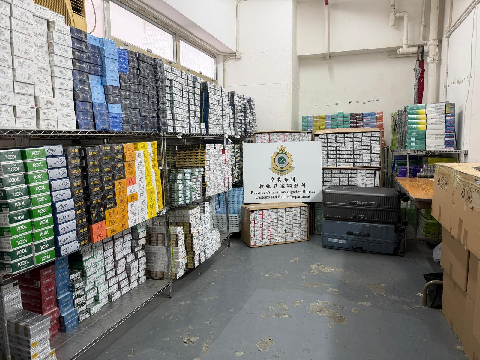 Hong Kong Customs shut down a suspected illicit cigarette and alternative smoking products storage centre in Kwai Chung yesterday (March 25). A total of about 676 200 suspected illicit cigarettes and 94 200 suspected alternative smoking products were seized. The total estimated market value was about $3.3 million while the duty potential of the suspected illicit cigarettes was about $2.2 million. One man suspected to be involved in the case was arrested. Photo shows the suspected illicit cigarettes and suspected alternative smoking products seized inside a unit in an industrial building. 