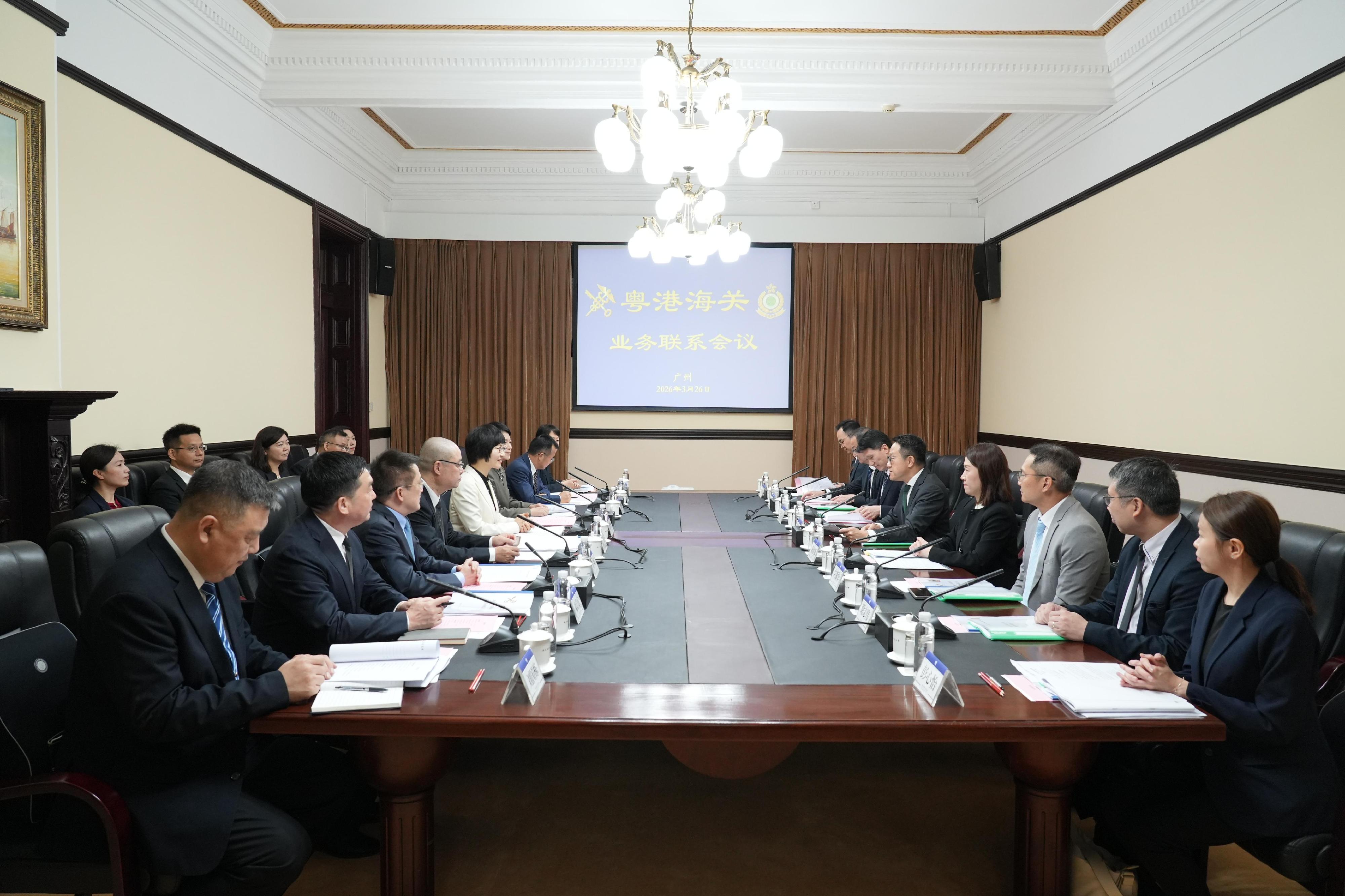 The Commissioner of Customs and Excise, Mr Chan Tsz-tat (fifth right), and the Director General of the Guangdong Sub-Administration of the General Administration of Customs of the People's Republic of China (GSAC), Ms Zhang Geping (front row, fifth left), today (March 26) officiated at the 2026 Review Meeting between the GSAC and Hong Kong Customs held in Guangzhou.
