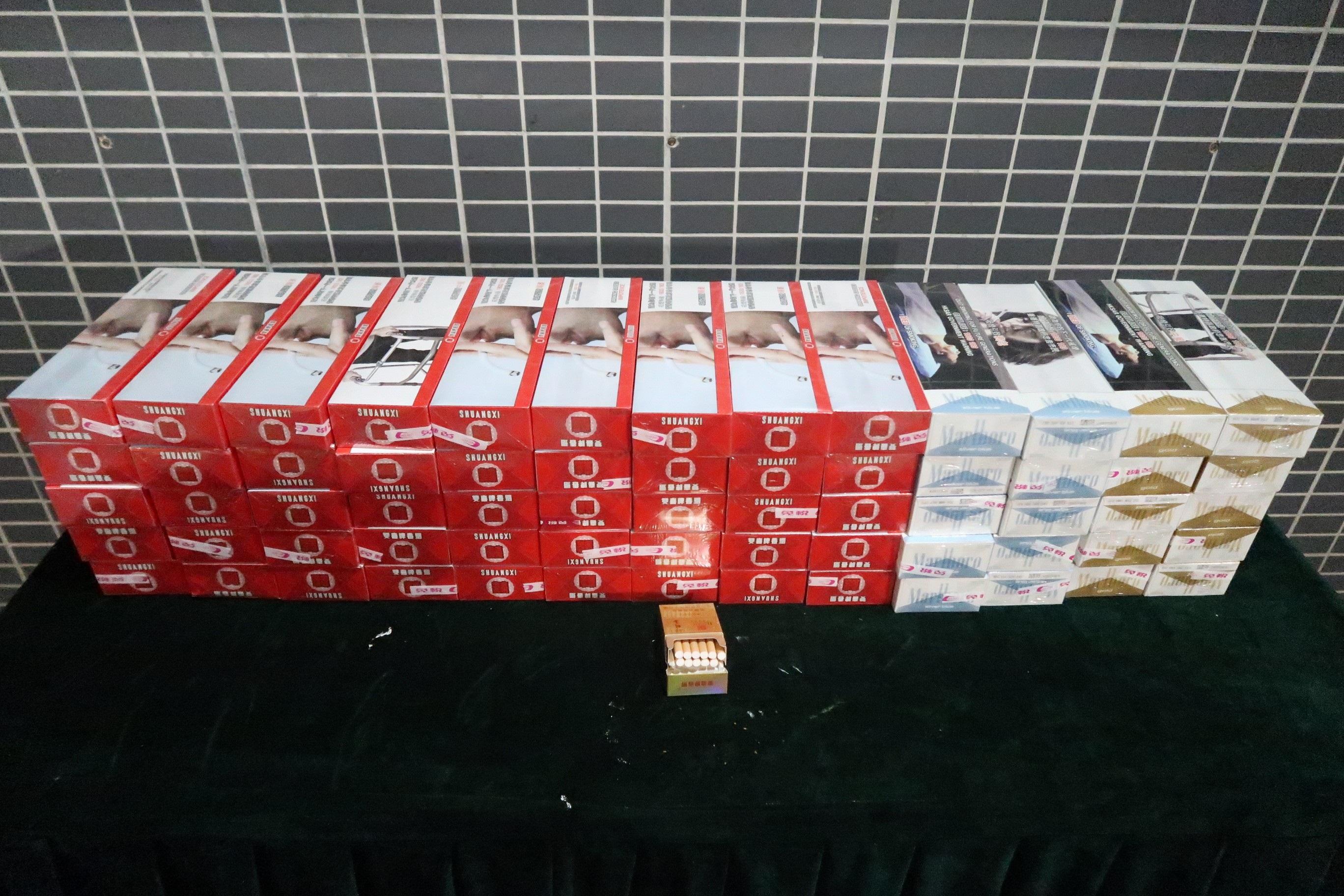 A 32-year-old man was sentenced to three months' imprisonment by the Tuen Mun Magistrates' Courts today (March 26) for smuggling duty-not-paid cigarettes using a cross-boundary private car, in contravention of the Import and Export Ordinance. Photo shows the duty-not-paid cigarettes seized.