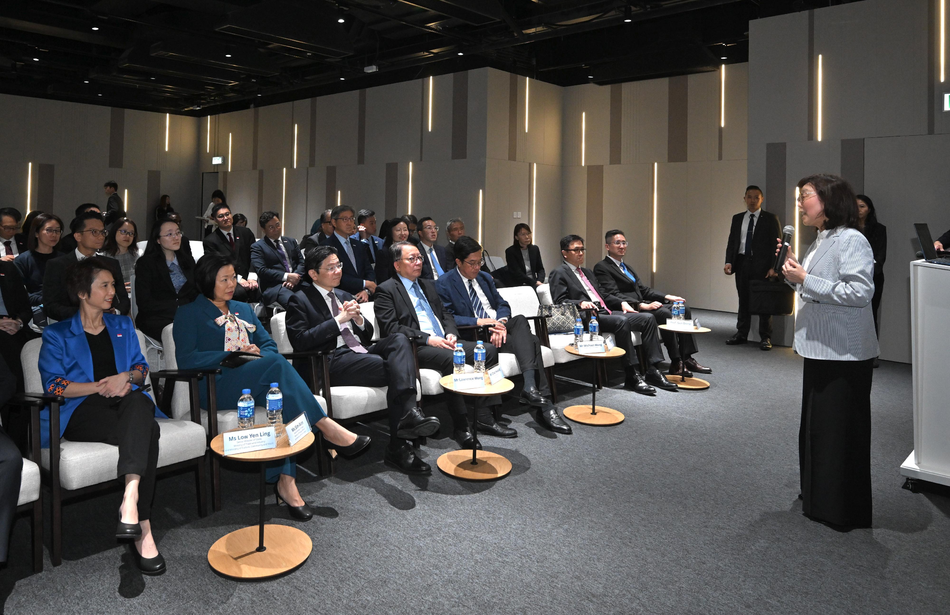 The Prime Minister and Minister for Finance of Singapore, Mr Lawrence Wong, visited the Hong Kong Park of the Hetao Shenzhen-Hong Kong Science and Technology Innovation Co-operation Zone in the Northern Metropolis (NM) today (March 27). Photo shows the Secretary for Development, Ms Bernadette Linn (first right) briefing Mr Wong (third left) and his delegation on the overall planning and latest development of the NM.