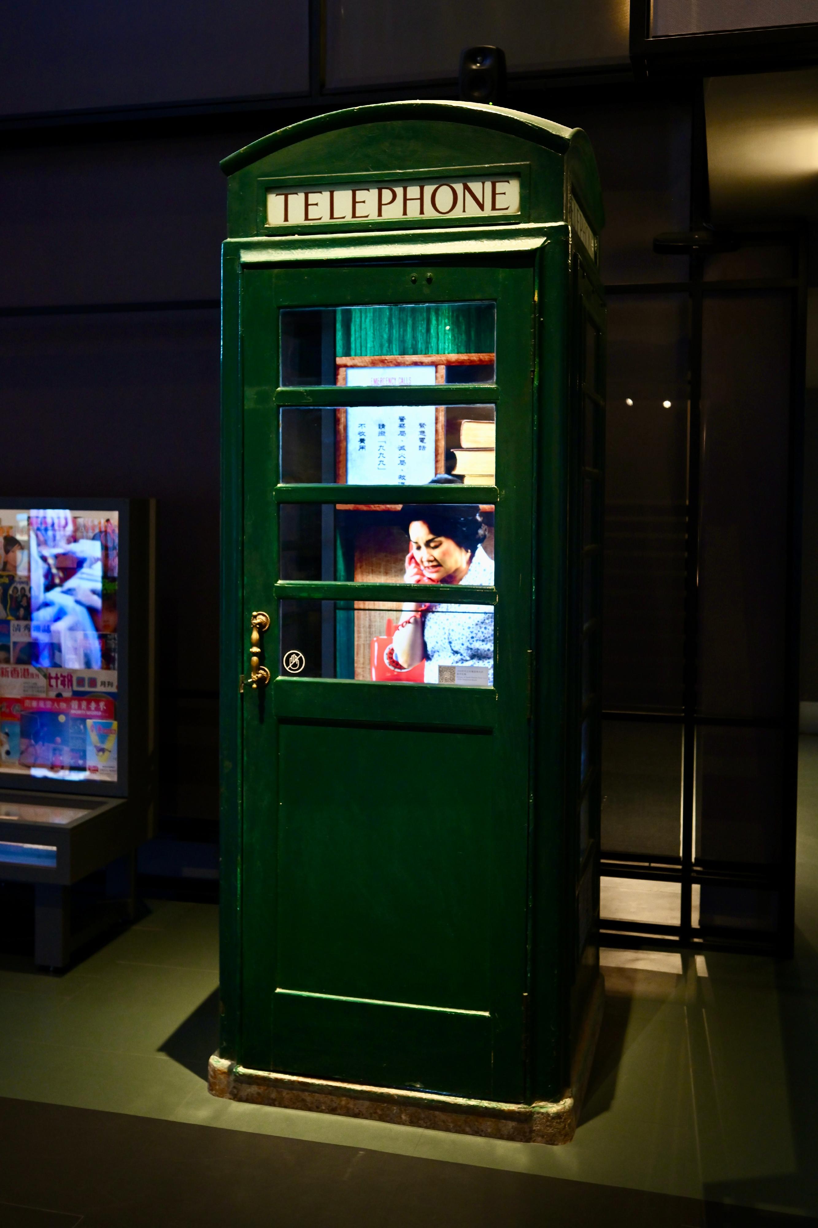 The Hong Kong Museum of History is staging the revamped permanent exhibition "Hong Kong Story" from tomorrow (April 1). Photo shows a green telephone booth from the 1960s-1970s.
