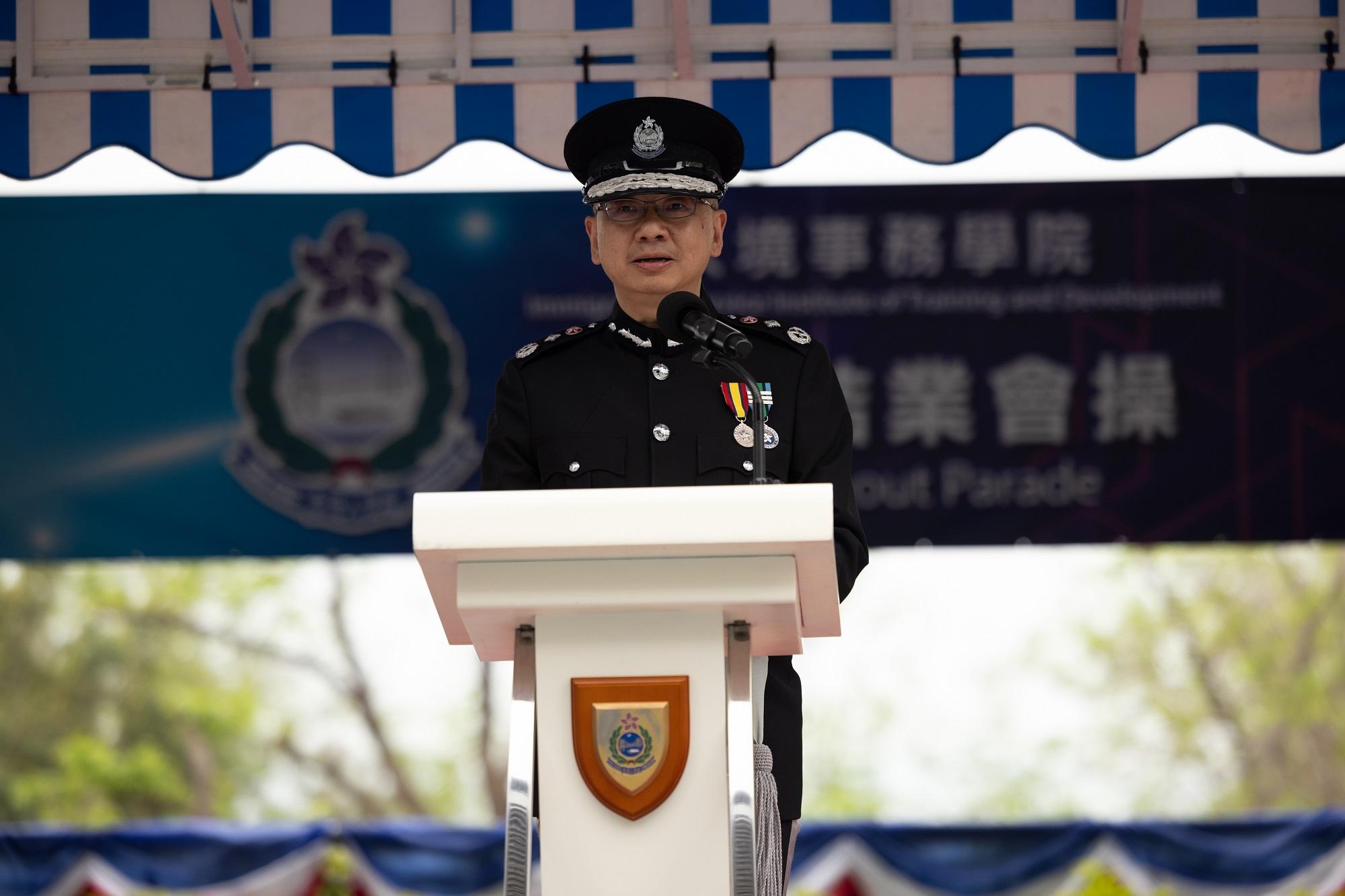 The Director of Immigration, Mr Benson Kwok, delivers a speech at the Immigration Service Institute of Training and Development Passing-out Parade today (April 1).