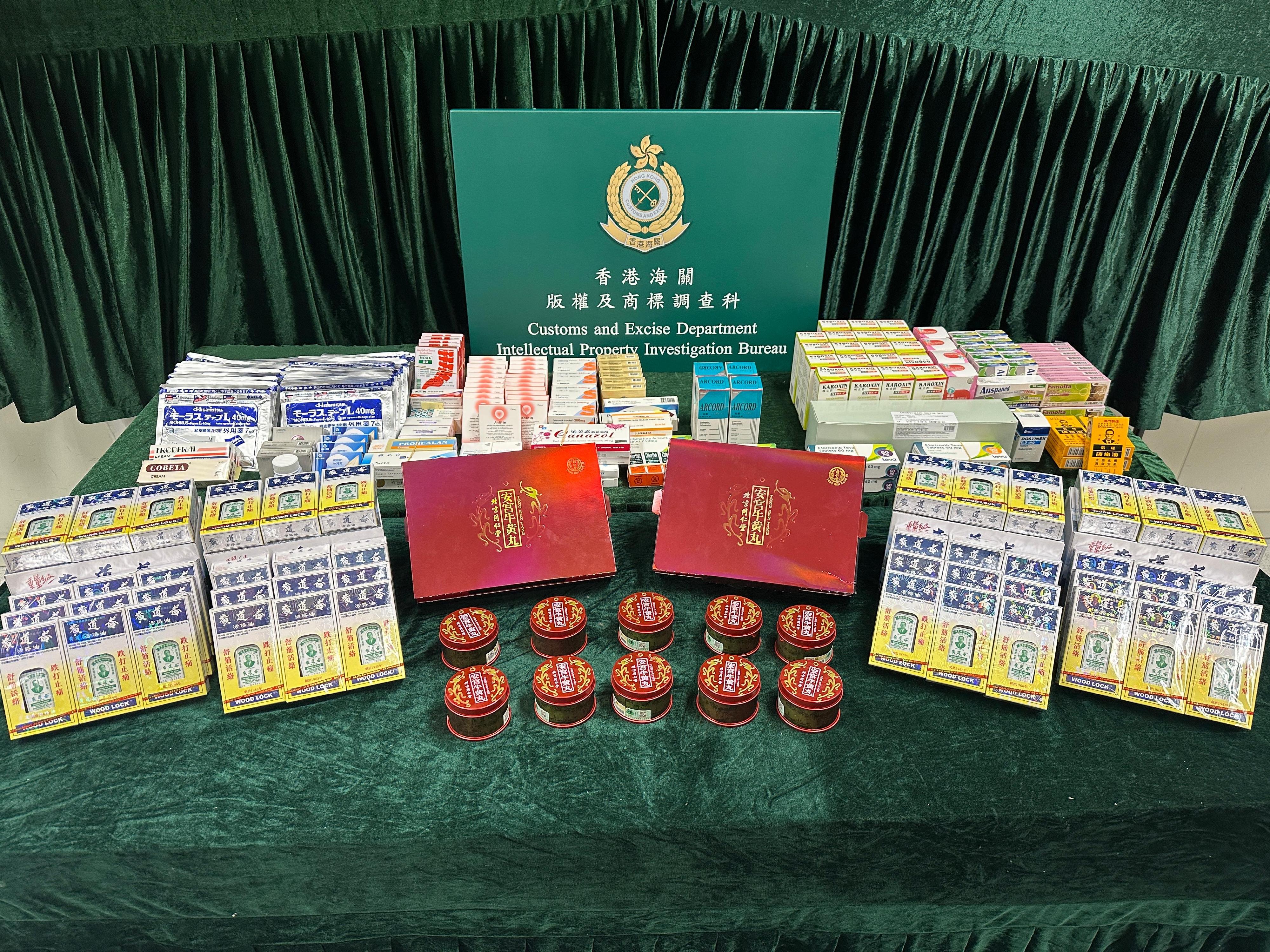 Hong Kong Customs conducted a special enforcement operation across shopping spots in Kowloon from March 24 to yesterday (April 1) to combat the sale of counterfeit proprietary Chinese medicines, and seized about 450 items of suspected counterfeit proprietary Chinese medicines and about 9 900 tablets of suspected controlled medicines with a total estimated market value of about $128,000. Photo shows some of the suspected counterfeit proprietary Chinese medicines and suspected controlled medicines seized.