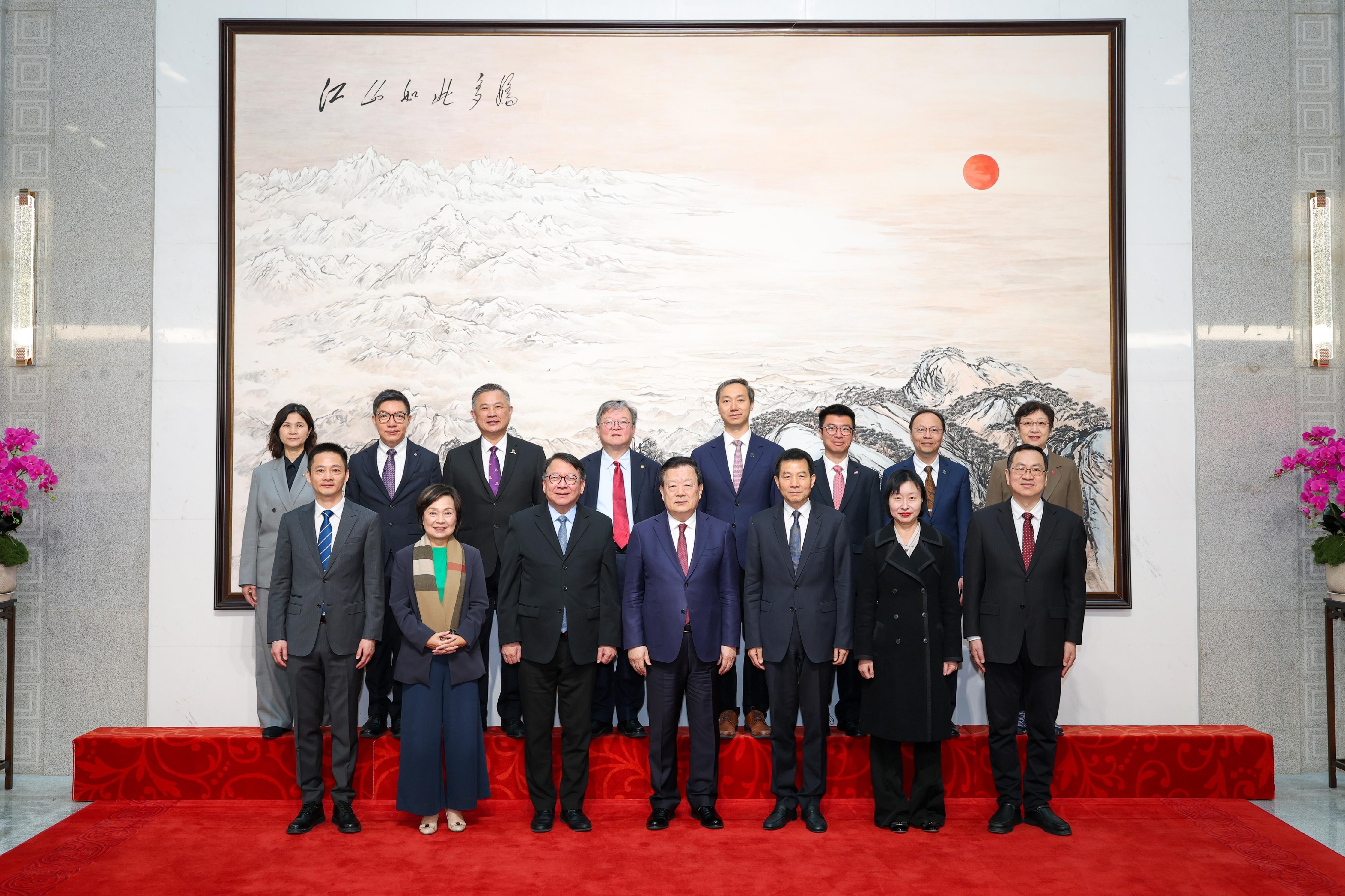 The Chief Secretary for Administration, Mr Chan Kwok-ki, today (April 2) led the delegation of the Working Group on Planning and Construction of the University Town under the Committee on Development of the Northern Metropolis to continue its visit to Beijing. Photo shows the Director of the Hong Kong and Macao Work Office of the Communist Party of China Central Committee and the Hong Kong and Macao Affairs Office of the State Council, Mr Xia Baolong (front row, centre), meeting Mr Chan (front row, third left); the Secretary for Education, Dr Choi Yuk-lin (front row, second left); the Director of the Northern Metropolis Co-ordination Office, Miss Linda So (front row, second left), and other members of the delegation in Beijing. The Executive Deputy Director of the Hong Kong and Macao Work Office of the Central Committee of the Communist Party of China and the Hong Kong and Macao Affairs Office of the State Council, Mr Xu Qifang (front row, third right), also attended the meeting.