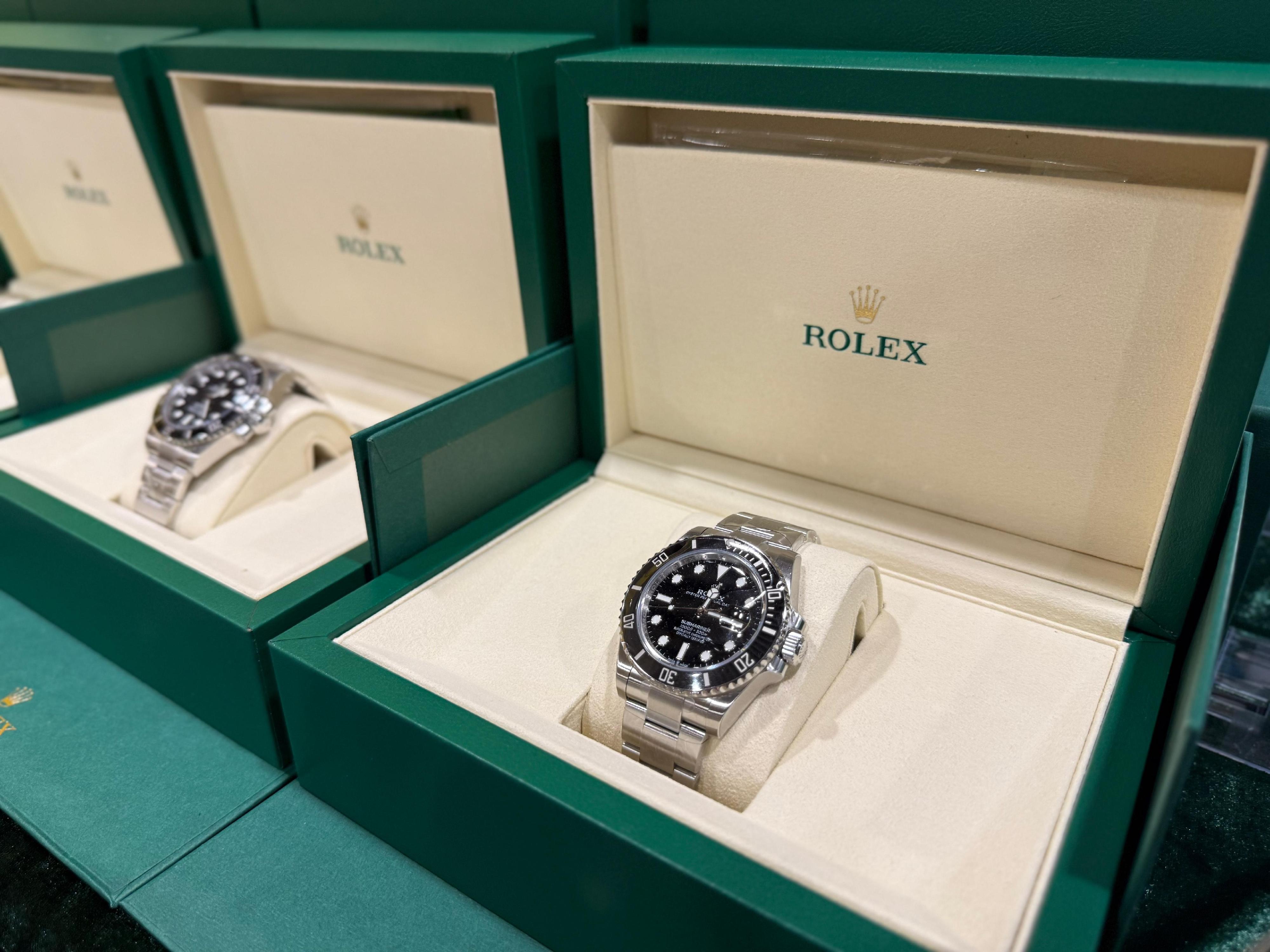 Hong Kong Customs conducted a three-week enforcement operation codenamed "Dawnbreaker" from March 9 to 27 to combat counterfeit and infringing goods activities involving cross-boundary transshipments and local deliveries. During the operation, Customs detected 37 related cases and seized about 110 000 items of suspected counterfeit goods with a total estimated market value of about $64 million. Photo shows some of the suspected counterfeit watches seized.