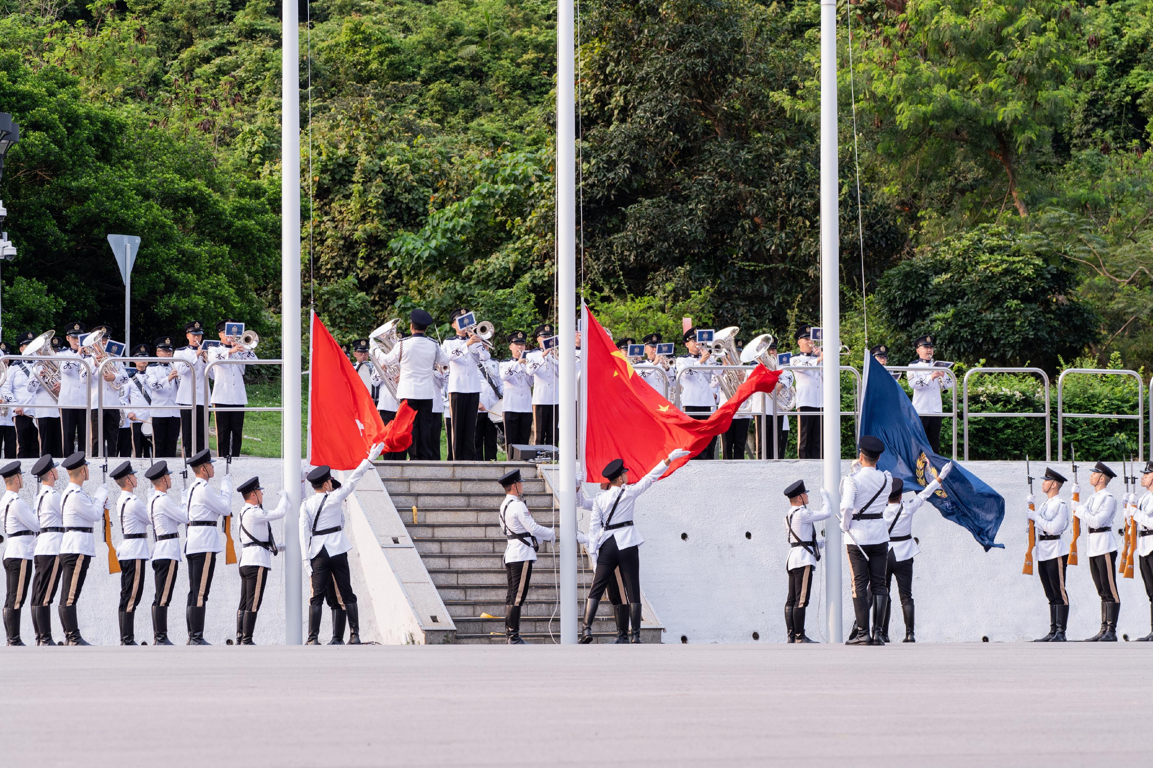 The Security Bureau and its disciplined services jointly held a National Security Education Day flag-raising ceremony at the Hong Kong Police College today (April 15).
