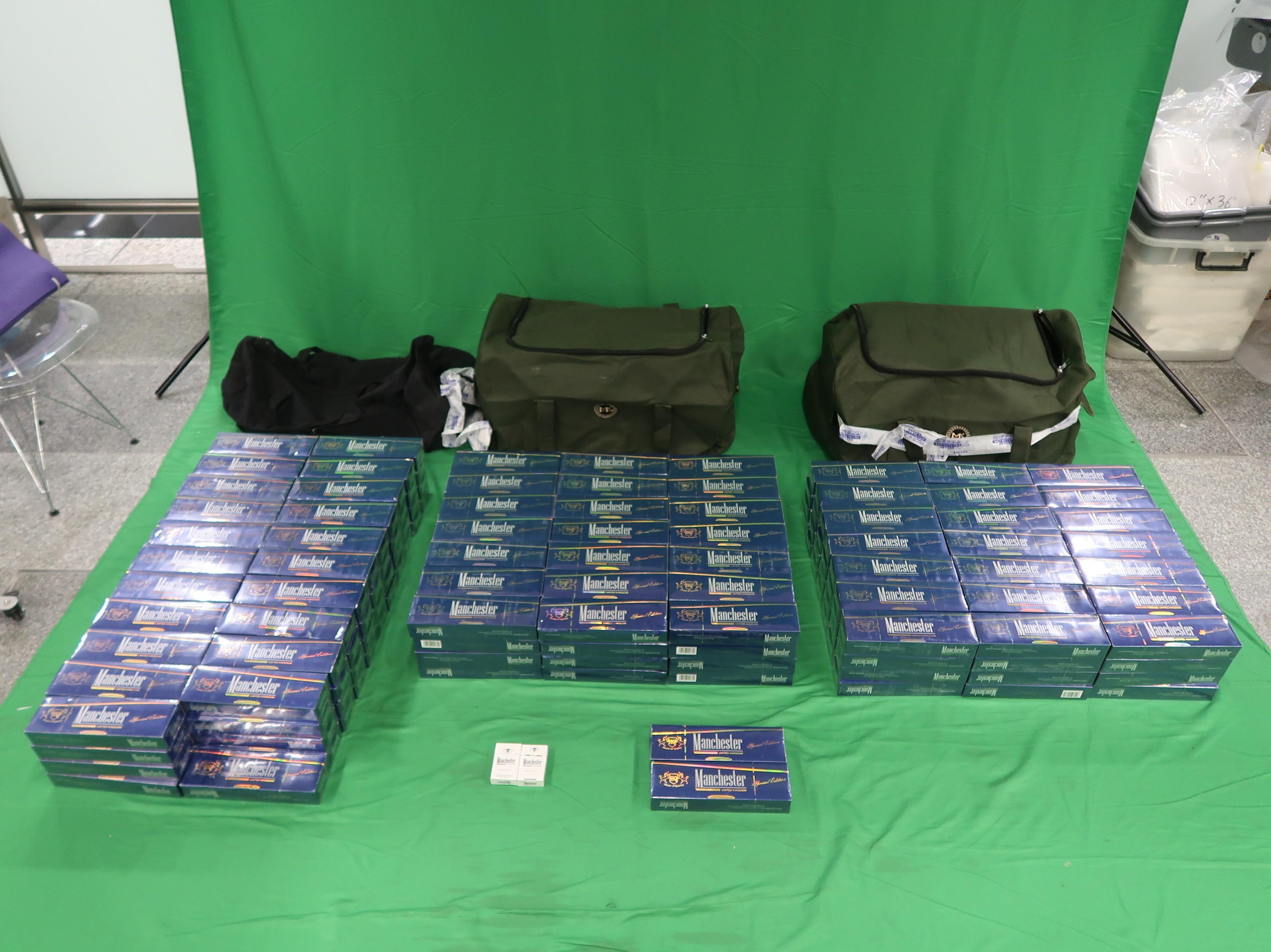 An incoming male passenger was sentenced to six months&rsquo; imprisonment and fined $2,000 by the West Kowloon Magistrates' Courts today (April 16) for importing duty-not-paid cigarettes and failing to declare them to Customs officers, in contravention of the Dutiable Commodities Ordinance. Photo shows the duty-not-paid cigarettes seized. 
