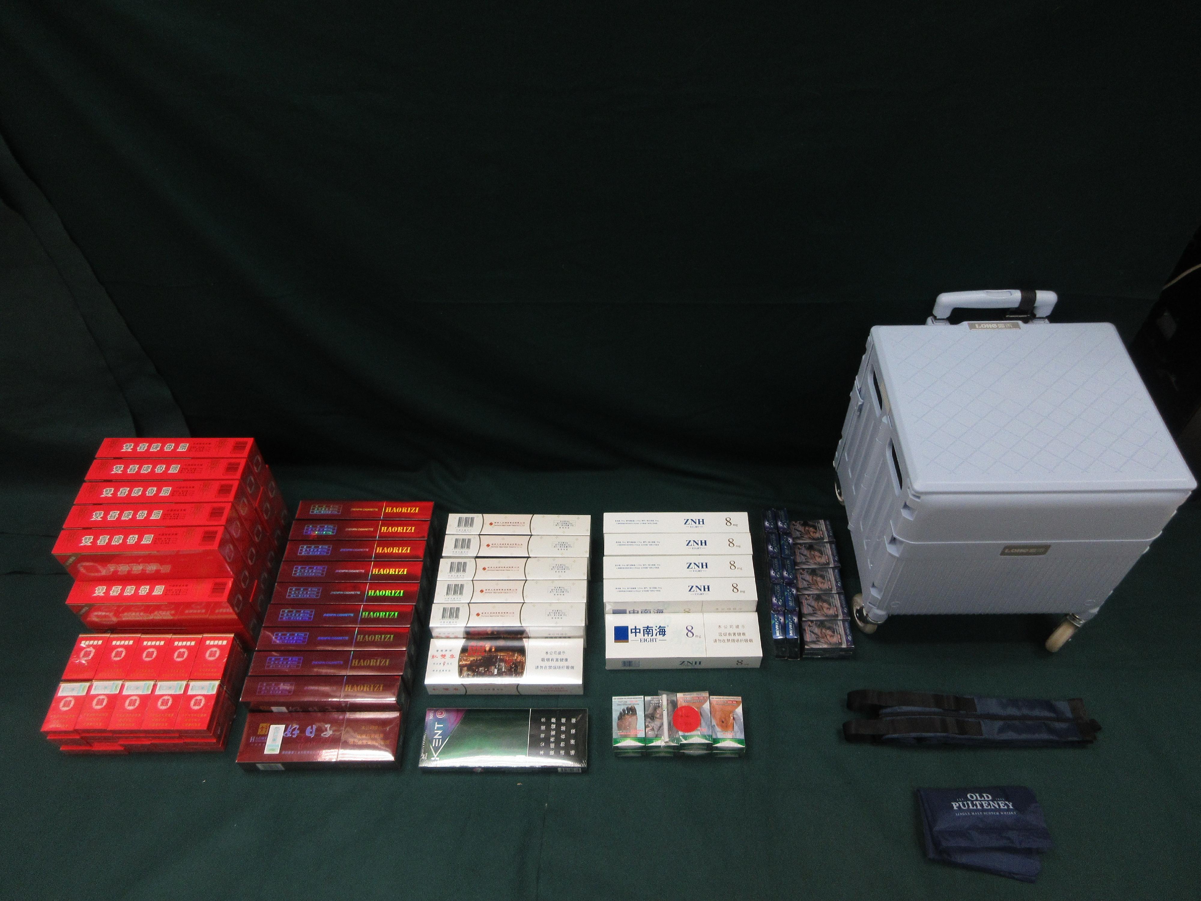 An incoming female passenger was sentenced to four months' imprisonment and fined $1,000 by the Fanling Magistrates' Courts today (April 17) for possessing duty-not-paid cigarettes and failing to declare them to Customs officers, in contravention of the Dutiable Commodities Ordinance. Photo shows the duty-not-paid cigarettes seized.