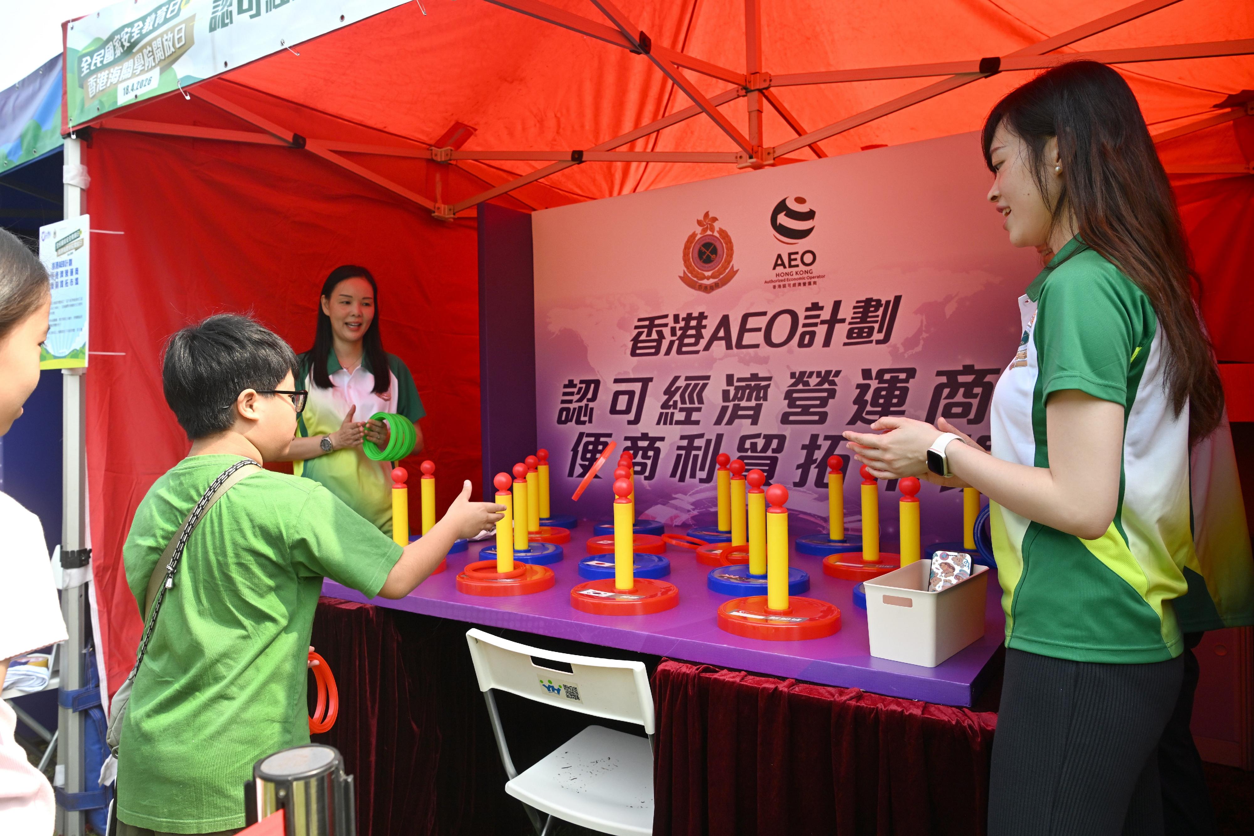 Hong Kong Customs today (April 18) held the Hong Kong Customs College Open Day. Photo shows a member of public playing at the game booths.