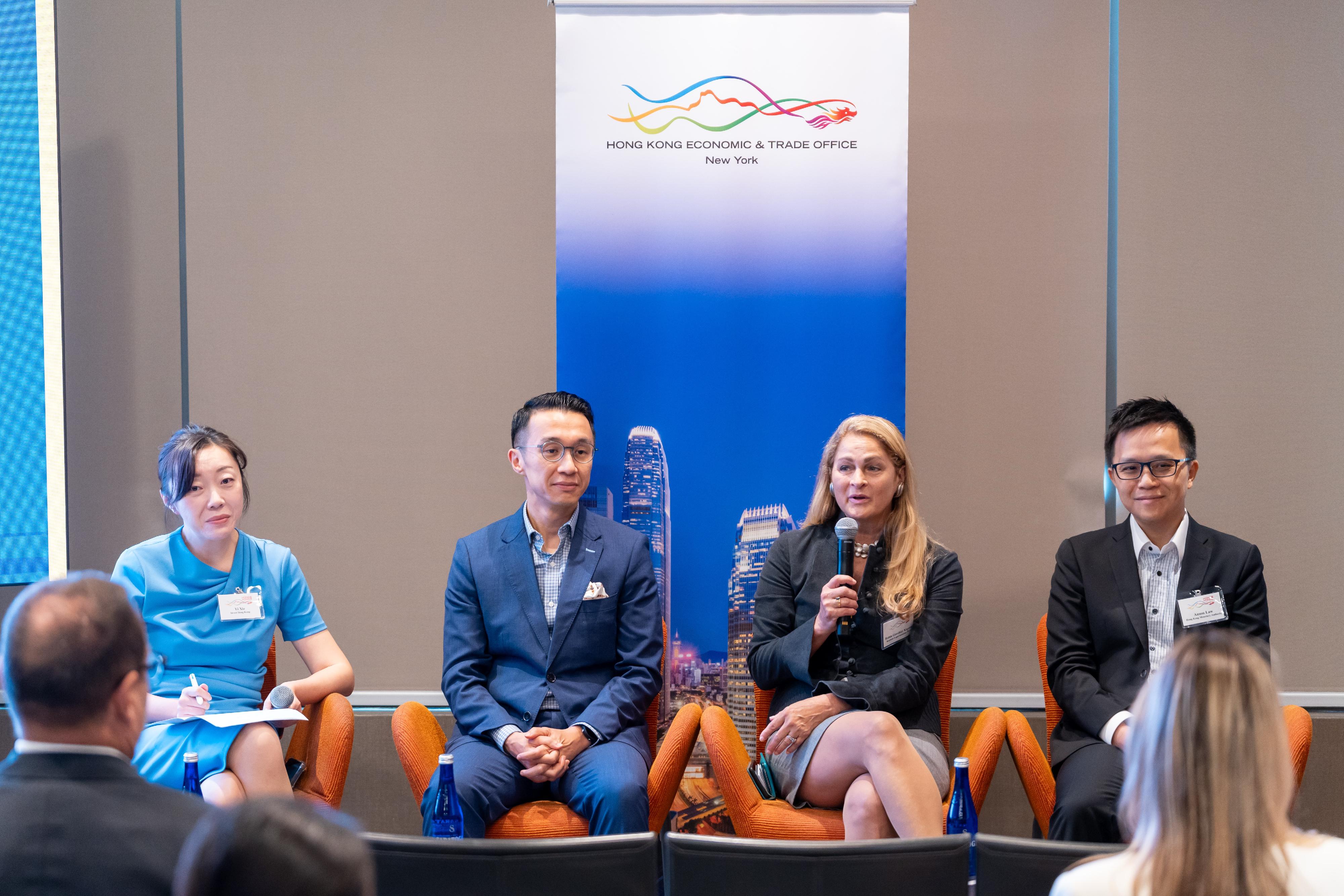 The Hong Kong Economic and Trade Office, New York (New York ETO) hosted a business forum in Miami, Florida on April 16 (Miami time), bringing together close to 70 participants from the business and investment communities to explore financial opportunities in Hong Kong. Photo shows the featured panel discussion at the forum with: the Chief Representative of the Hong Kong Monetary Authority in New York, Mr Anson Law (first right); the Founder and Principal of Kaptzan Legal Solutions, Ms Robin Kaptzan (second right); and the Executive Director of the Financial Services Development Council, Dr Rocky Tung (second left). The session was moderated by the Head of Business and Talent Attraction/Investment Promotion at Invest Hong Kong in New York, Ms Yi Xie (first left).