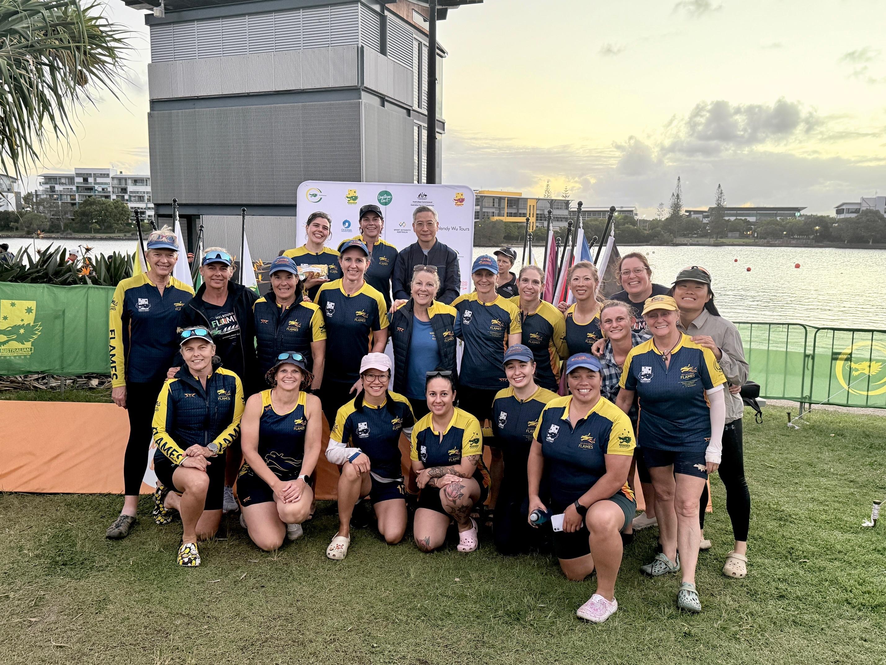 The Hong Kong Economic and Trade Office, Sydney (Sydney ETO) is supporting the Australian Dragon Boat Championships being held in the Sunshine Coast, Queensland, Australia, from April 18 to 23 to promote Hong Kong's dynamic sports culture and longstanding dragon boat racing tradition. Photo shows the Director of the Sydney ETO, Mr Ricky Chong (third row, third left), with a winning team at the Australian Dragon Boat Championships yesterday (April 18).