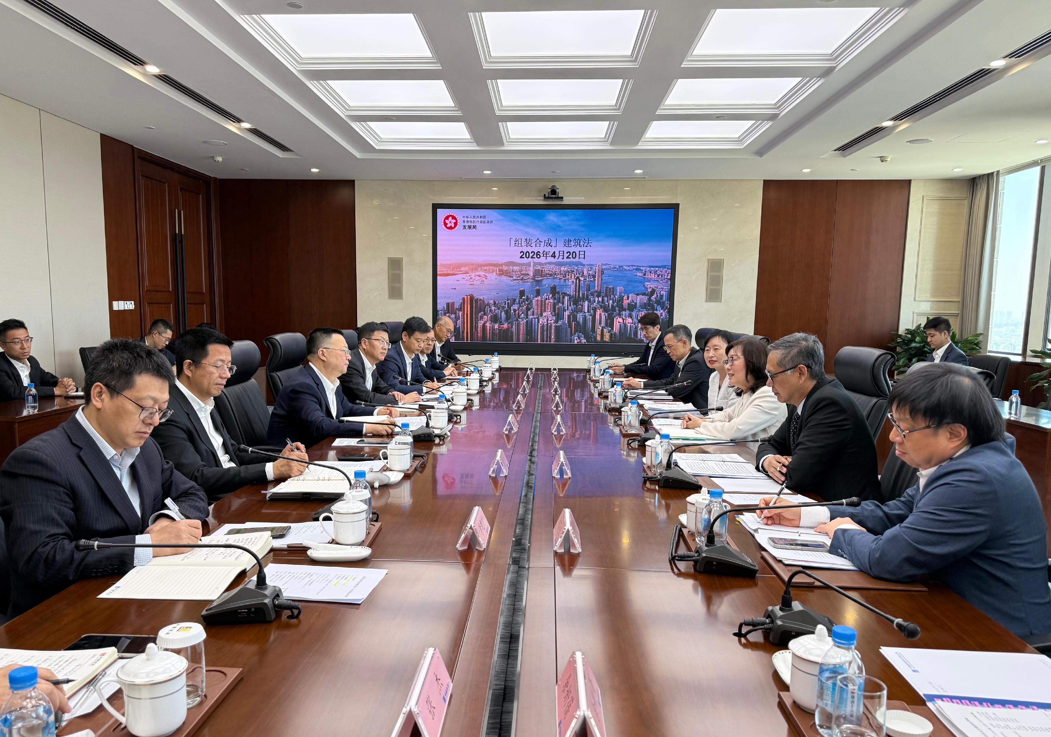 The Secretary for Development, Ms Bernadette Linn (third right), today (April 20) met with Vice President of the China State Construction Engineering Corporation Mr Chen Yong (third left) and his team in Beijing. The Permanent Secretary for Development (Works), Mr Ricky Lau (second right); the Director of the Northern Metropolis Co-ordination Office, Ms Linda So (fourth right); and Deputy Secretary for Development (Works) Mr Tony Ho (first right) also attended.